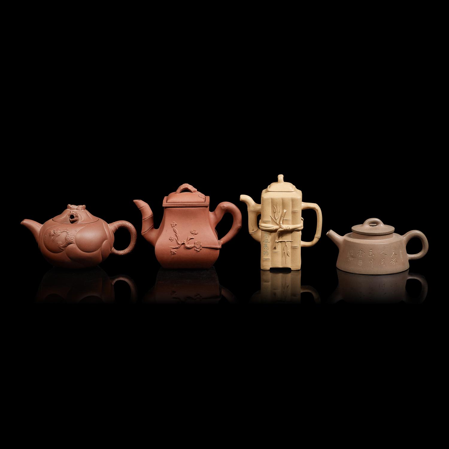 Four Chinese Yixing Zisha Stoneware Teapots, 20th Century 近現代 宜興紫砂茶壺四件