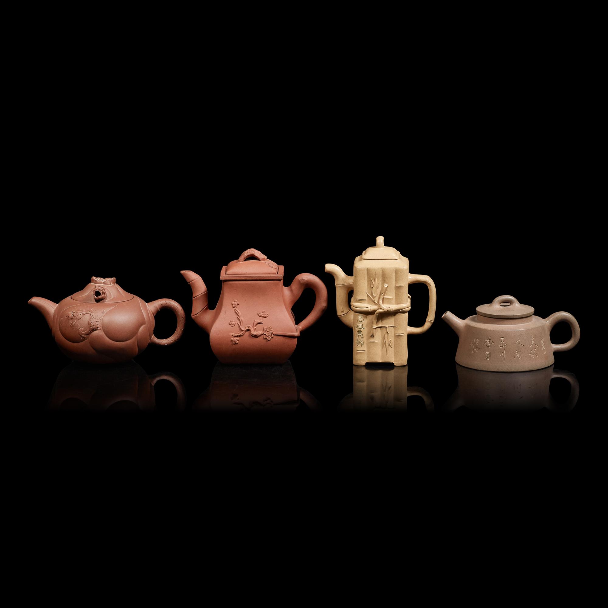 Four Chinese Yixing Zisha Stoneware Teapots, 20th Century 近現代 宜興紫砂茶壺四件