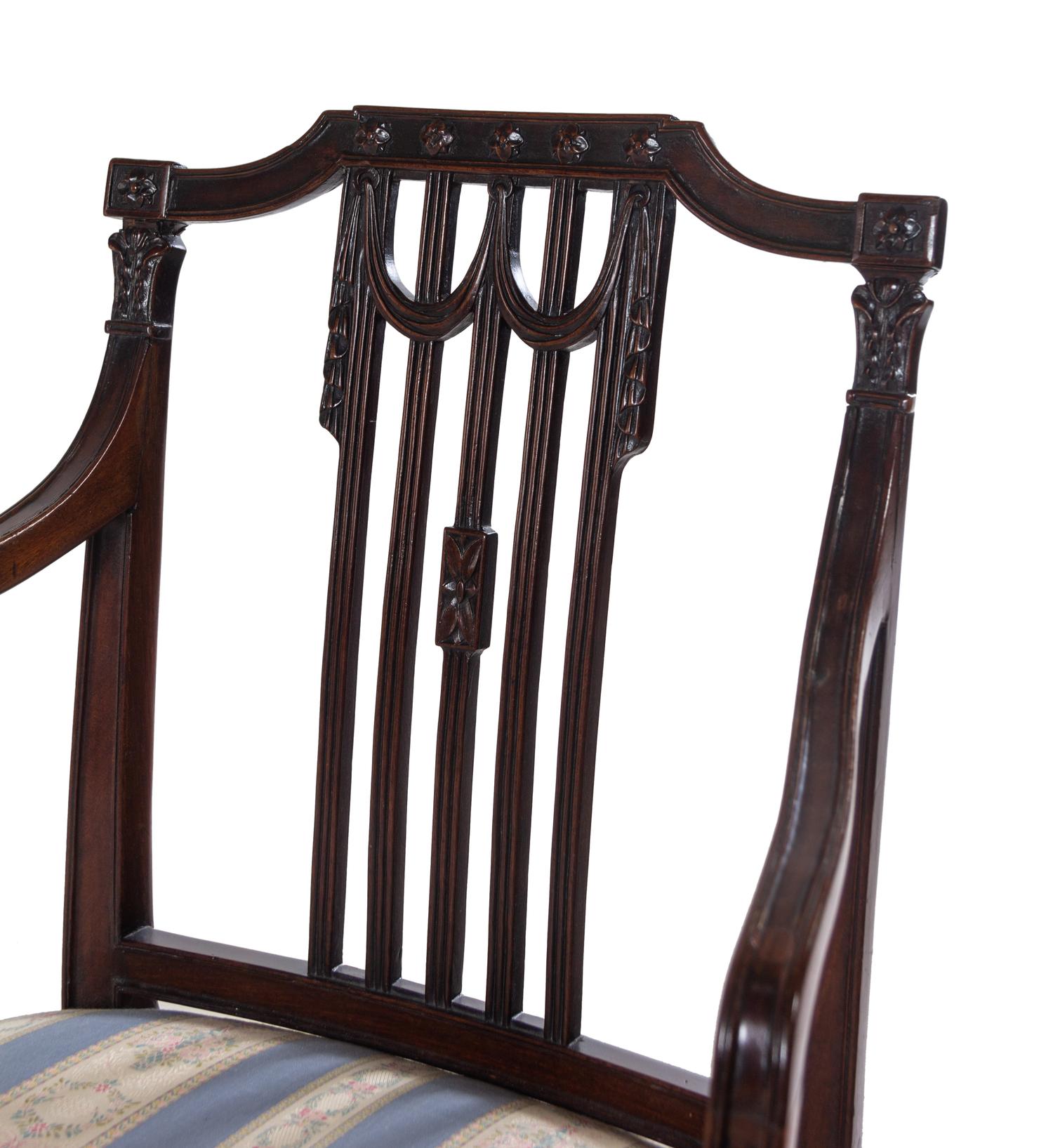 A George III Carved Mahogany Armchair