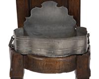 An Italian Carved Walnut Lavabo with Pewter Cistern and Basin
