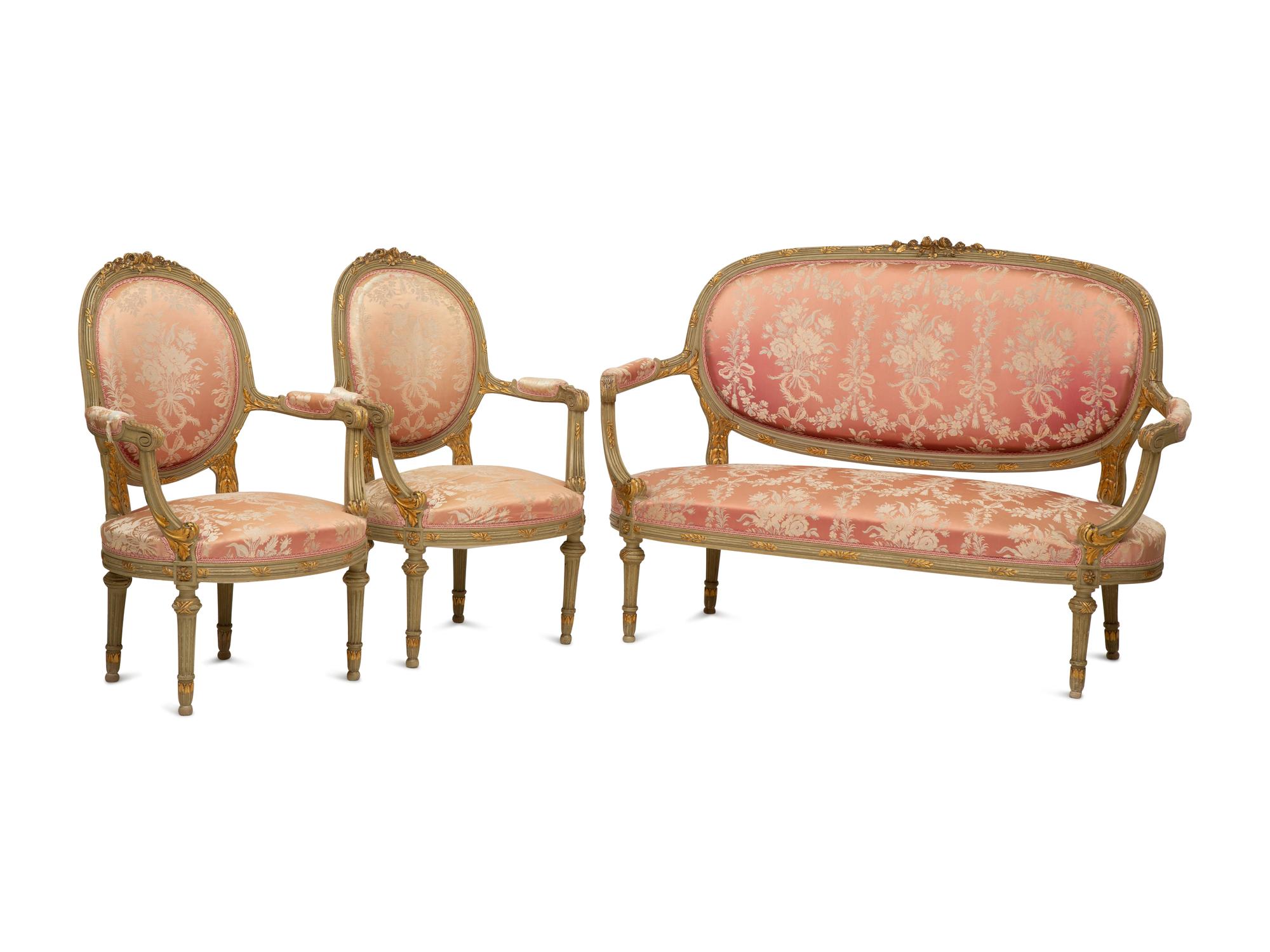 A Louis XVI Style Painted and Parcel Gilt Three-Piece Seating Suite