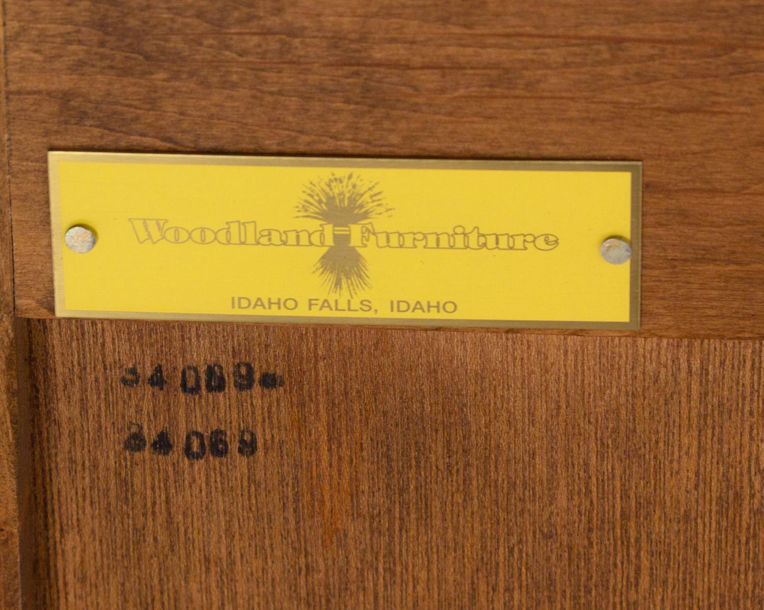 A Contemporary Carved Walnut Chest of Drawers