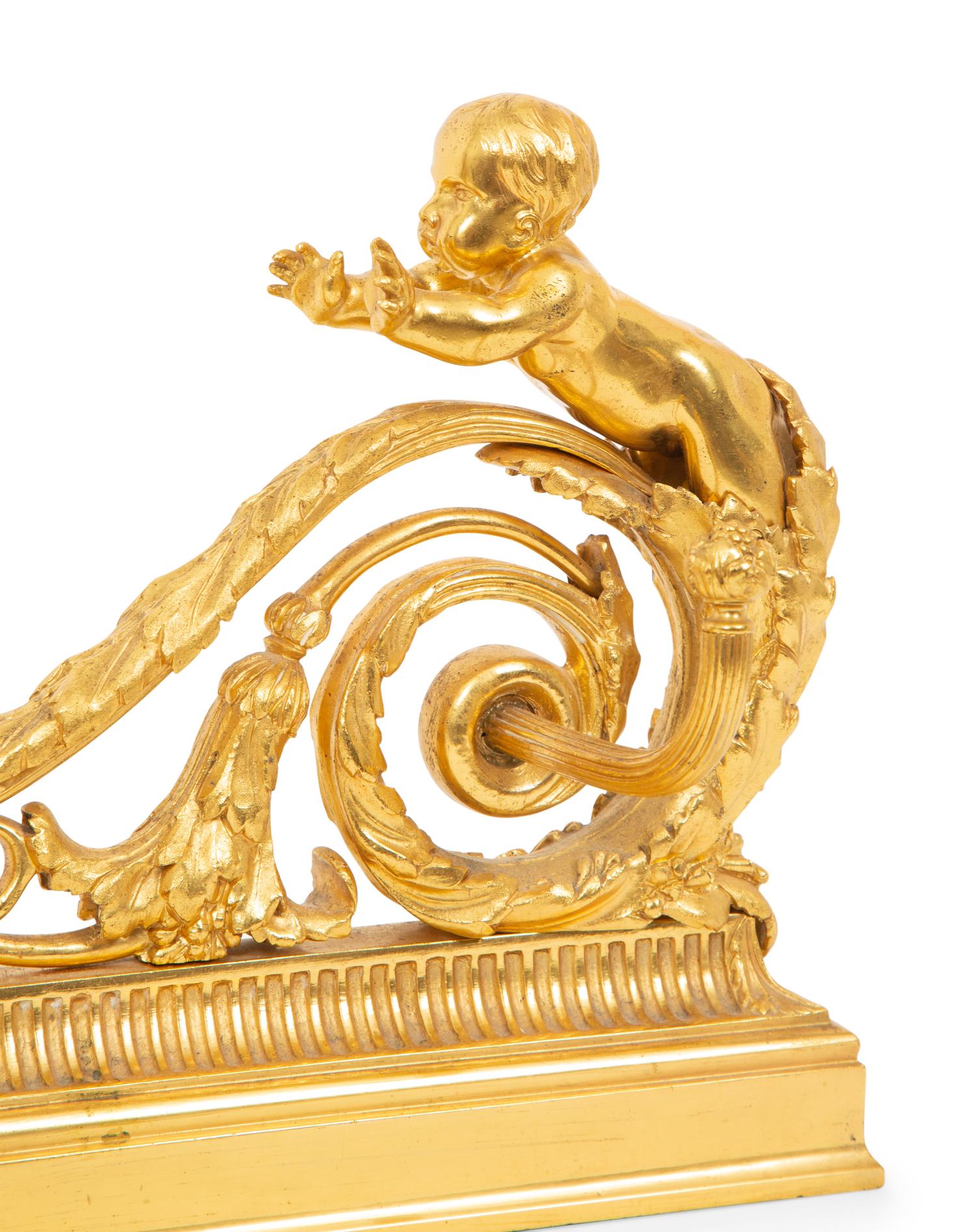 A Pair of Louis XVI Style Gilt Bronze Chenets