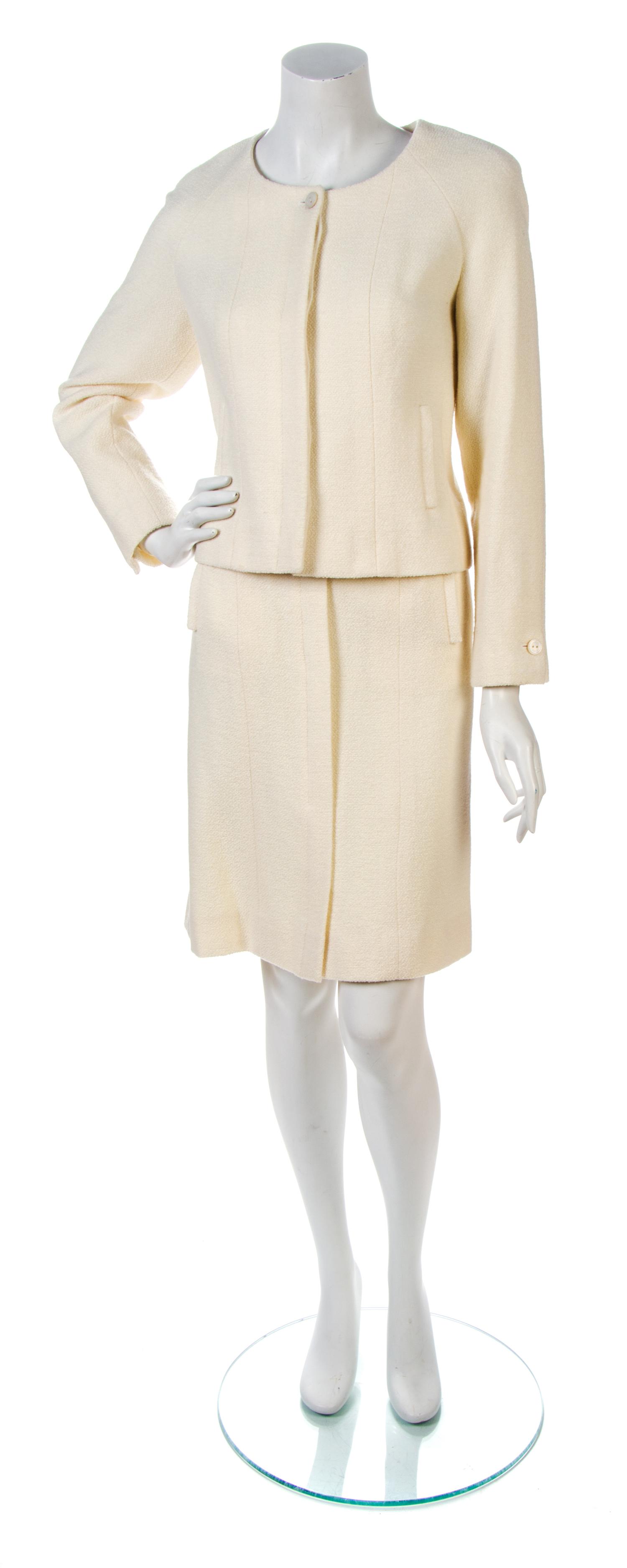 A Chanel Ivory Wool Skirt Suit, Jacket size 42, skirt size 42.