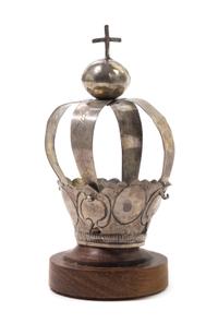 A Diminutive Silver Crown, Likely Central American, surmounted by a globus cruciger, having conforming ribs with repeating geometric de