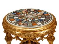A Louis XVI Style Giltwood and Specimen Marble Center Table