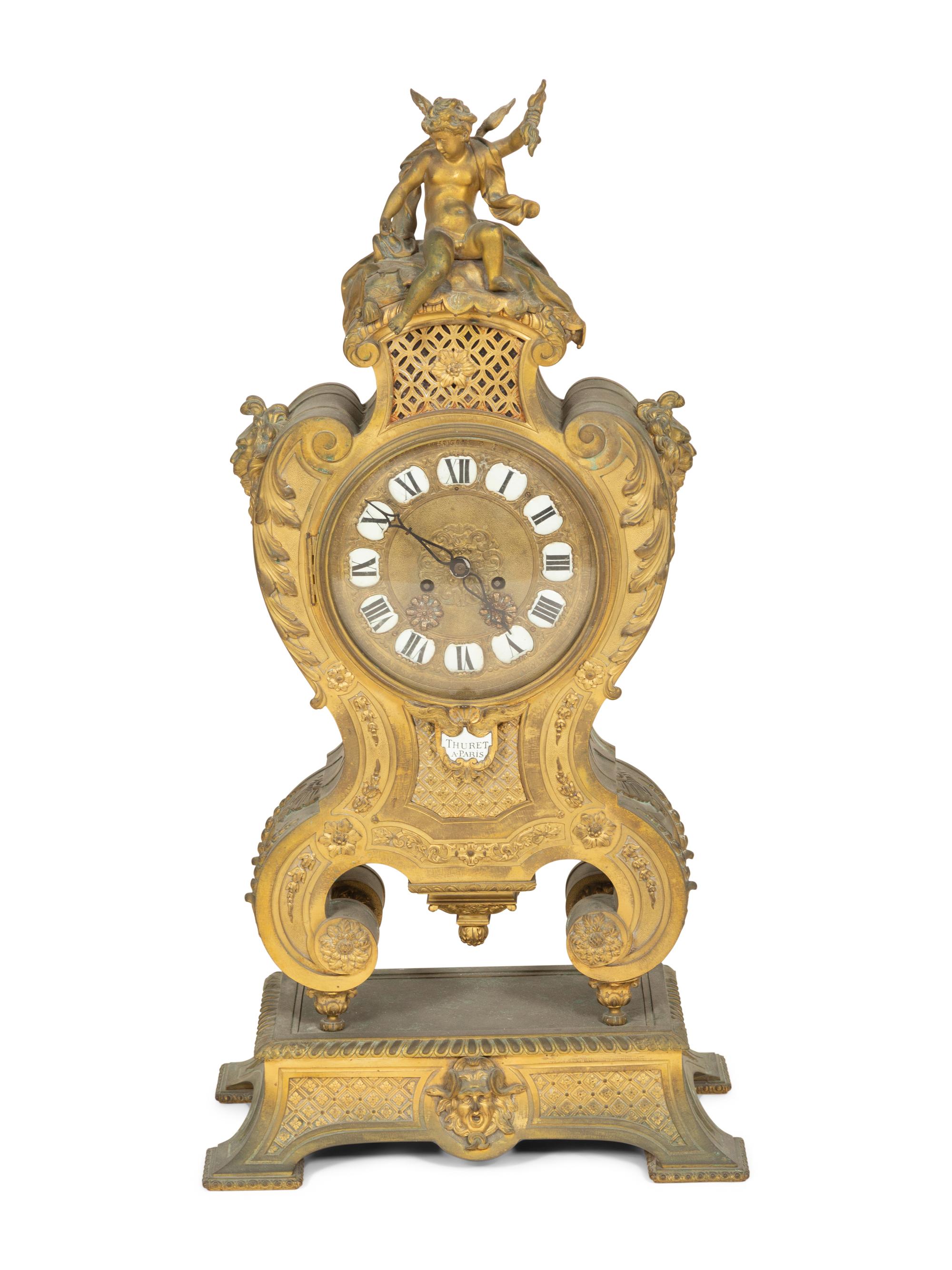 A Louis XV Style Gilt Bronze Mantle Clock on Stand