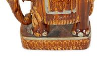 A Glazed Ceramic Elelphant Table — 20th Century