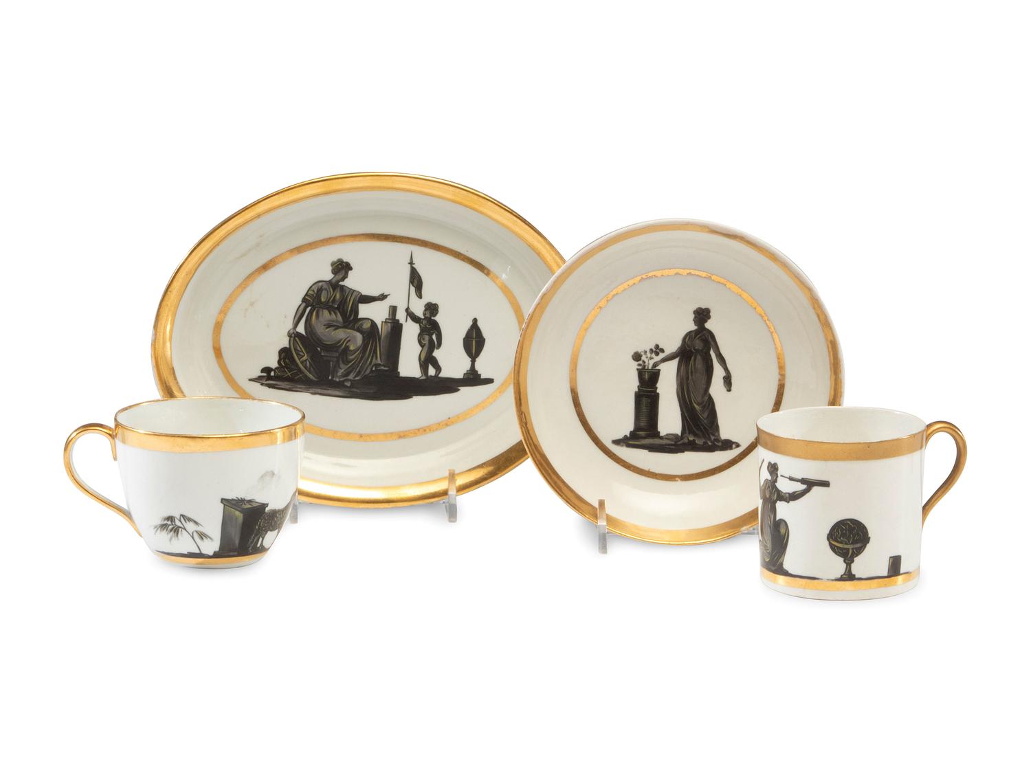 An English Porcelain Bat-Printed and Parcel Gilt Porcelain Tea Service