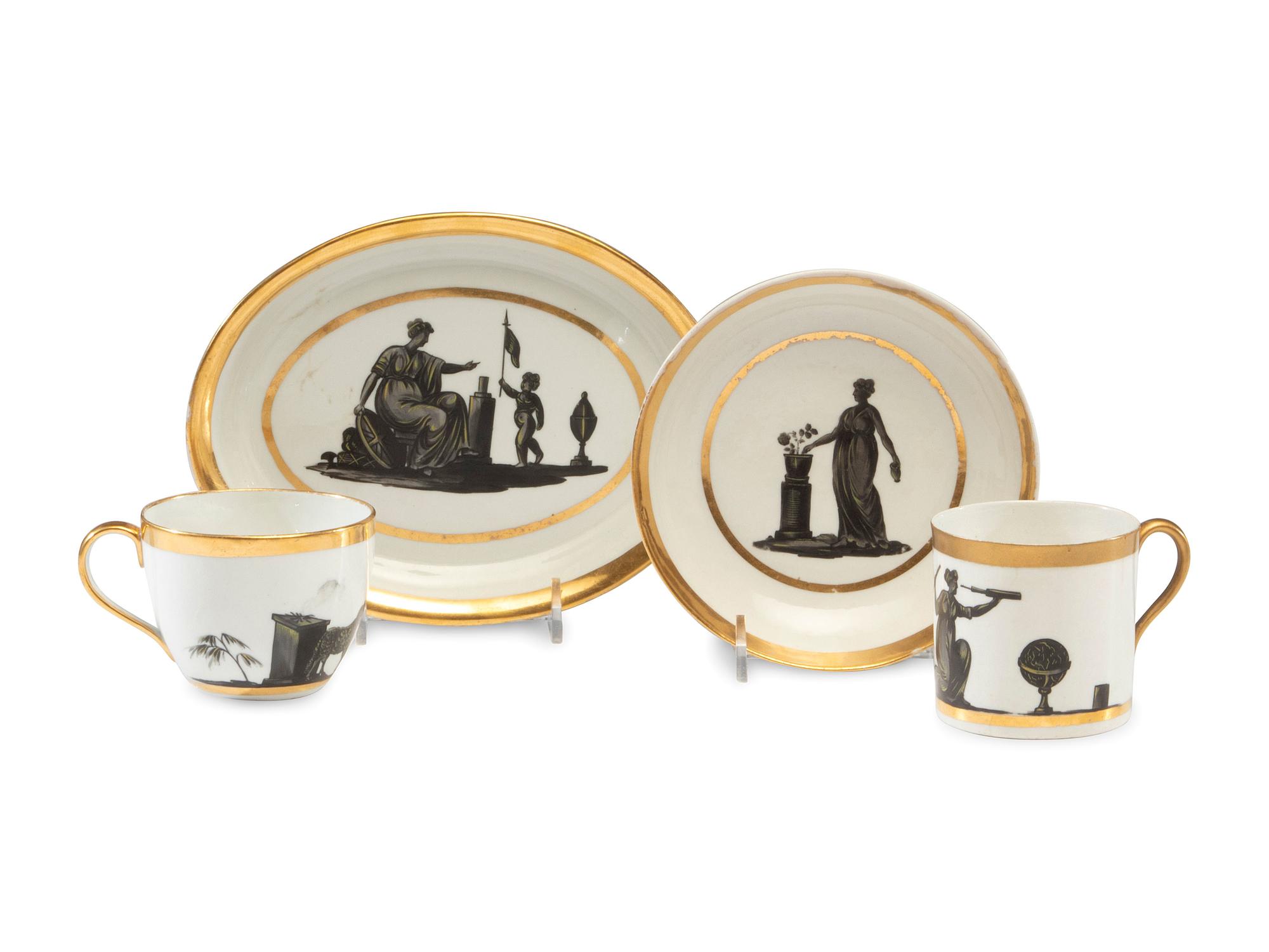 An English Porcelain Bat-Printed and Parcel Gilt Porcelain Tea Service