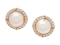 A Pair of 14 Karat Bicolor Gold, Cultured Mabe Pearl and Diamond Earclips,