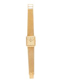 A 14 Karat Yellow Gold Wristwatch, Baume & Mercier,