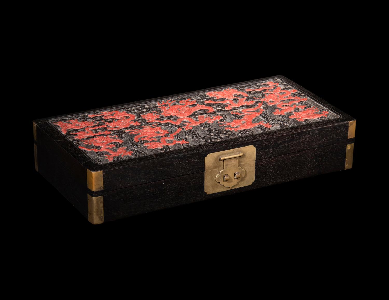 A Chinese Carved Red and Black Lacquer 'Dragon' Document Box