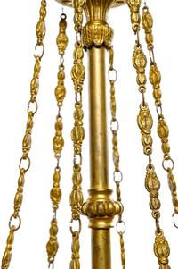 An Empire Style Gilt Bronze and Painted Tôle Six-Light Chandelier