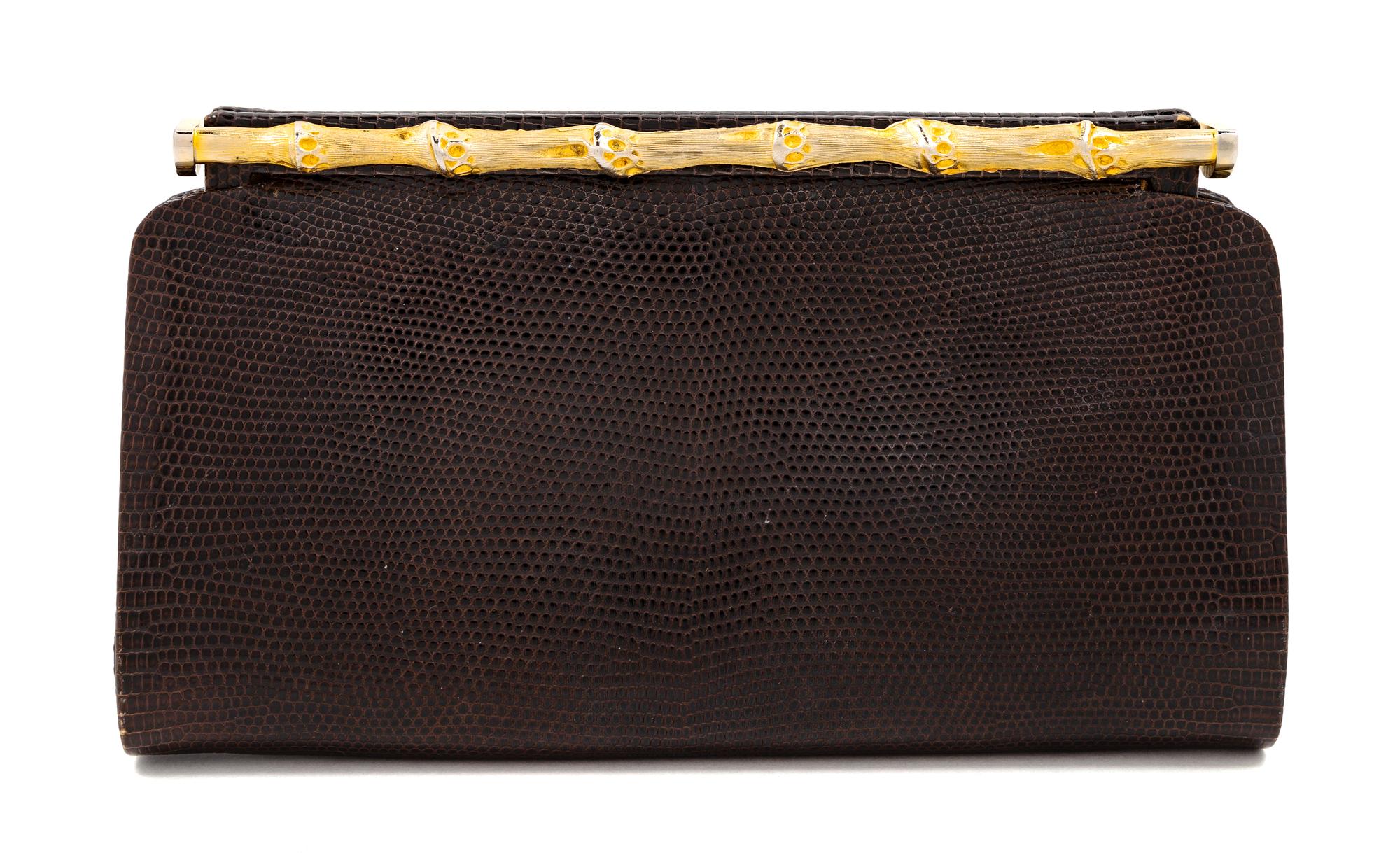 A Gucci Brown Snakeskin Clutch, 4.75" H x 8.25" W x 1.25" D.