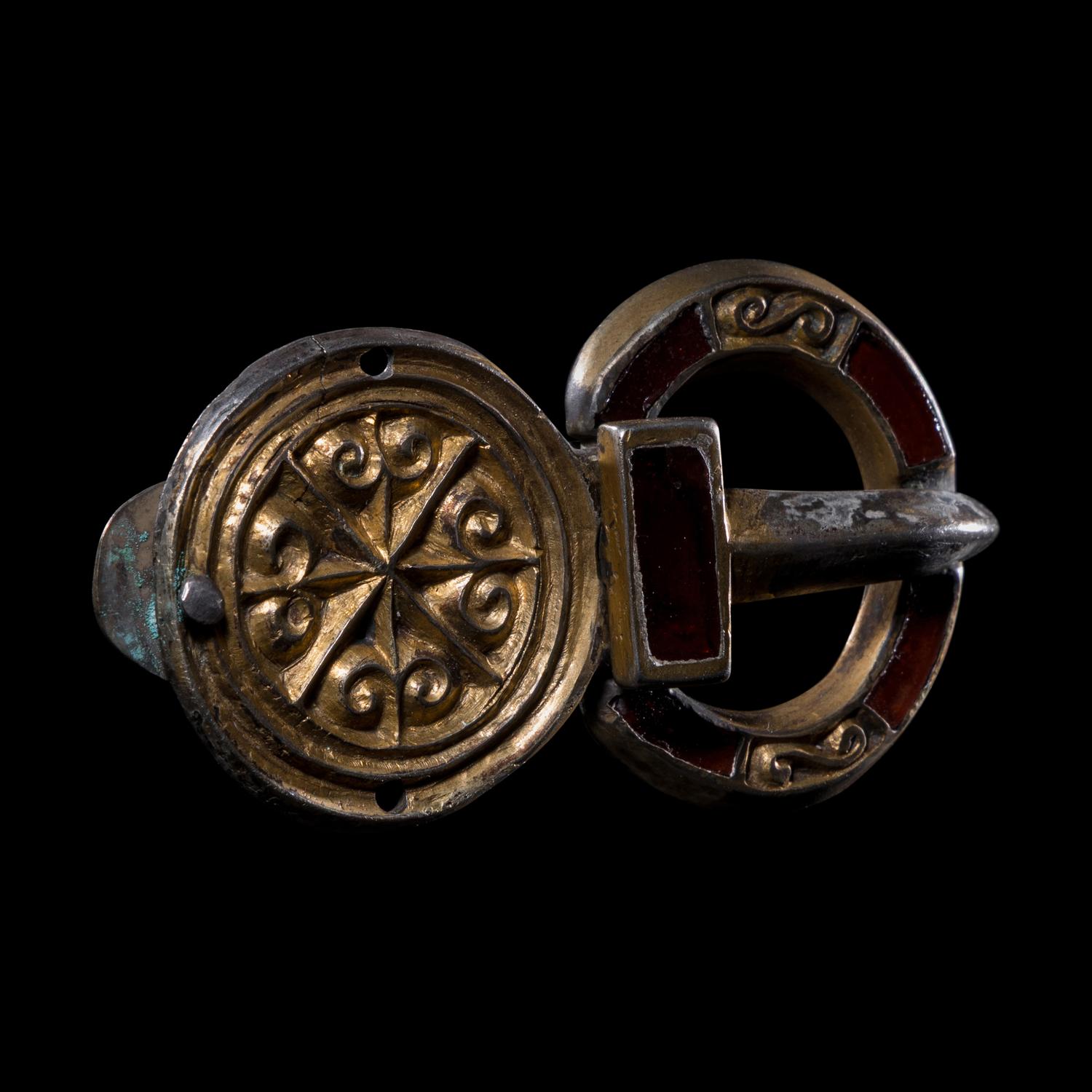A Merovingian Gilt-Silver and Garnet Belt Buckle