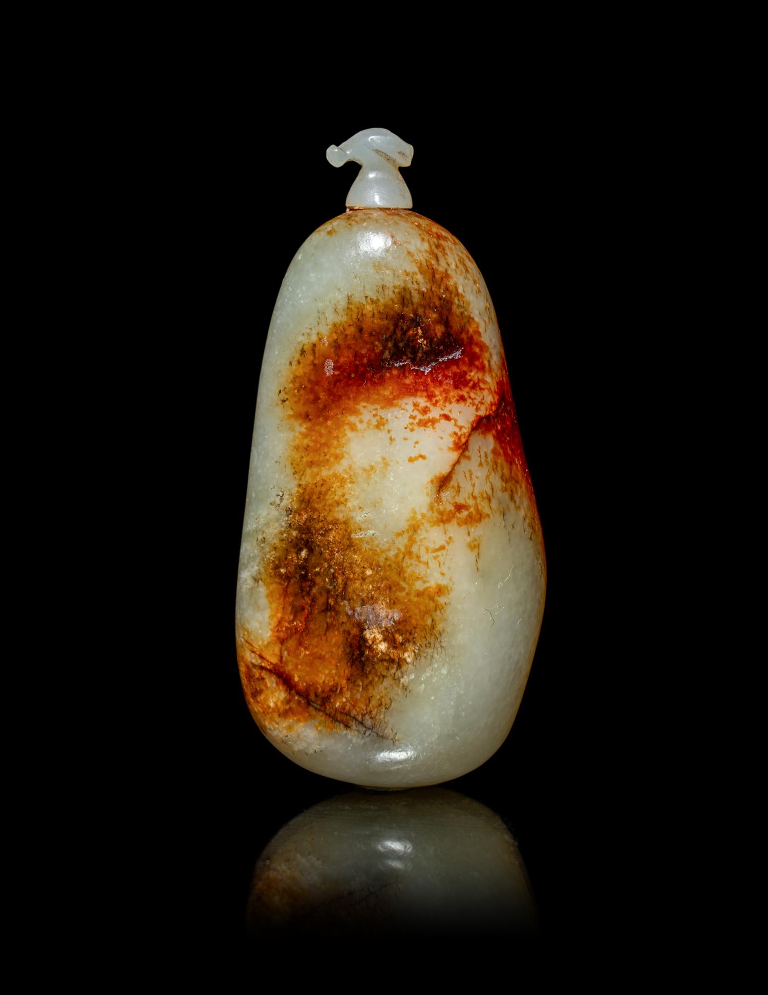A Chinese Russet and Pale Celadon Jade Pebble-Form Snuff Bottle