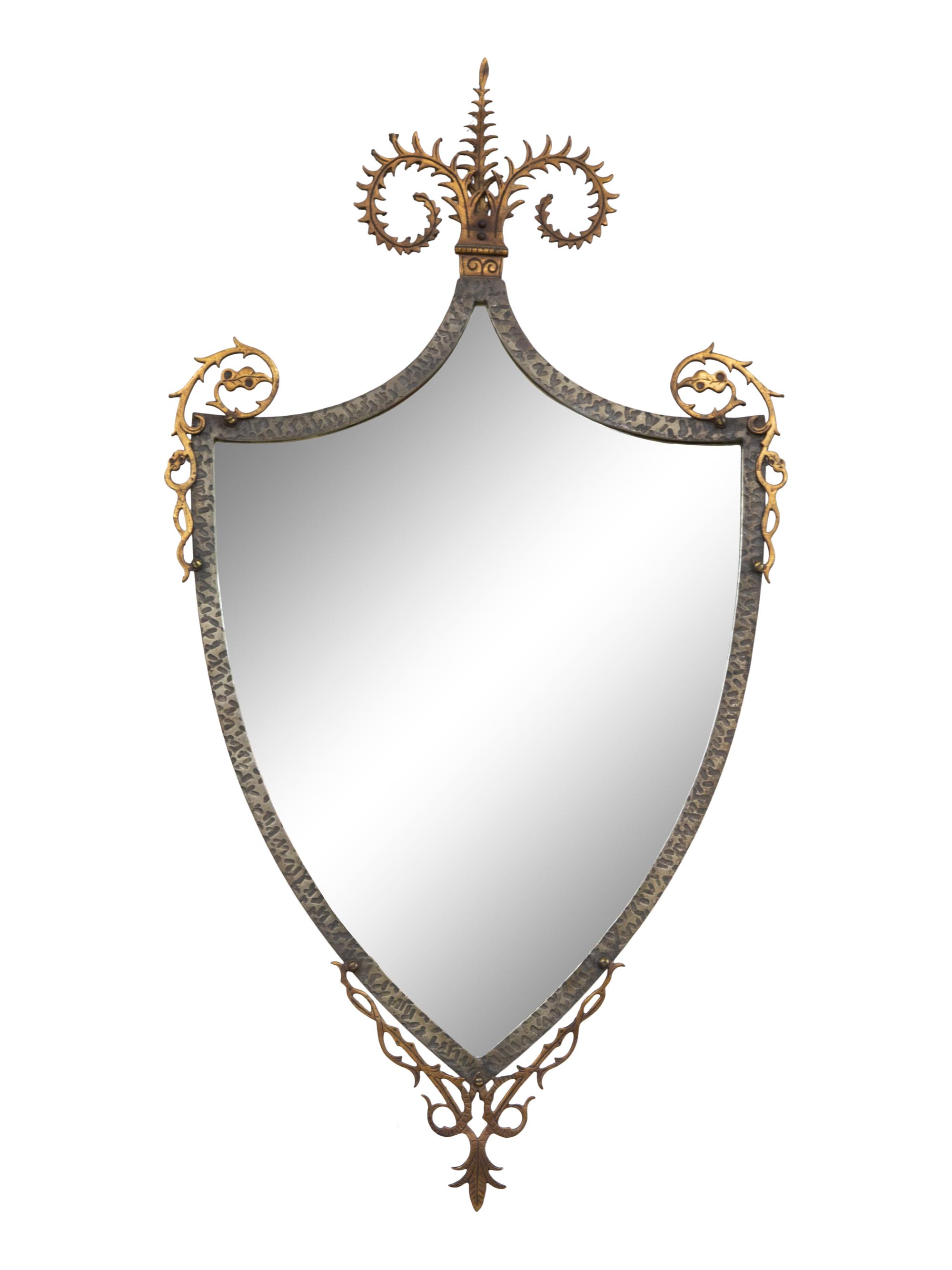 A Continental Brass and Iron Shield-form Mirror