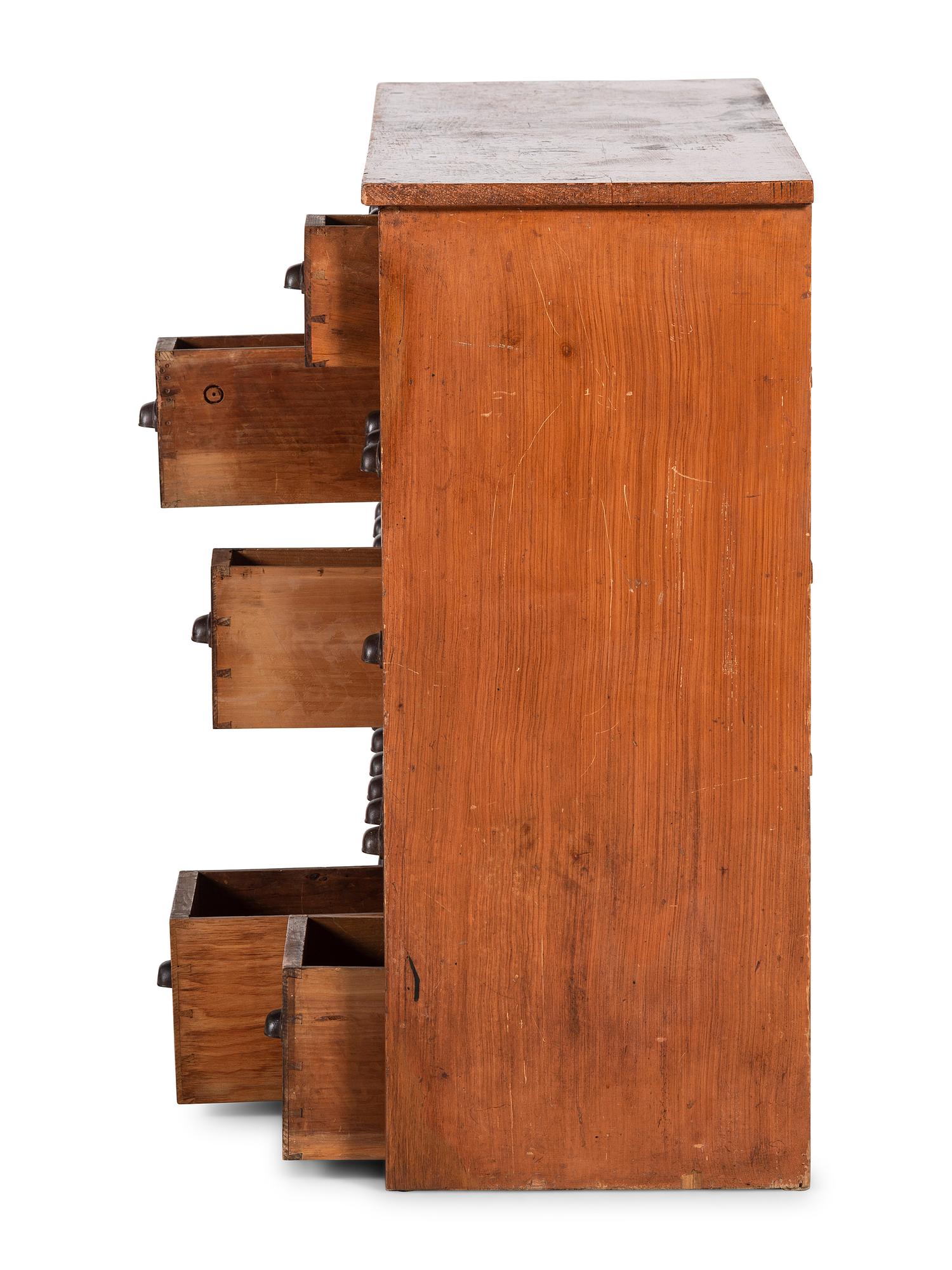 A Grain Painted Pine 36-Drawer Chest