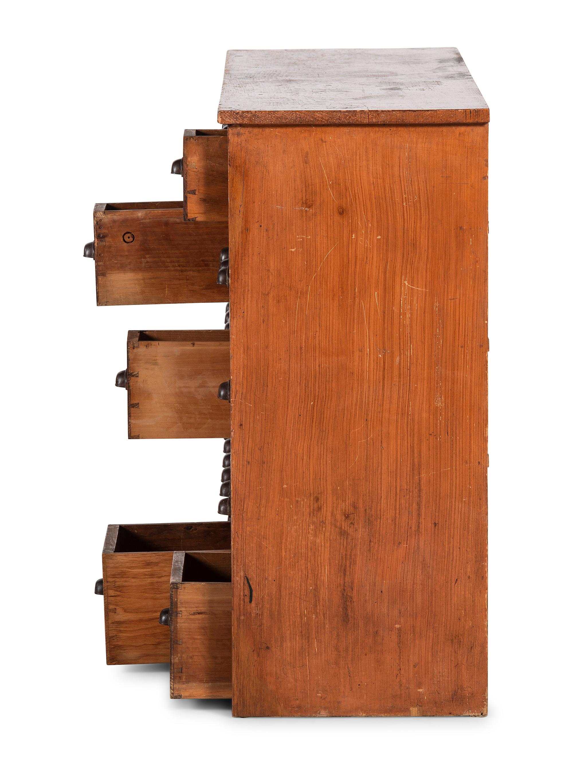 A Grain Painted Pine 36-Drawer Chest