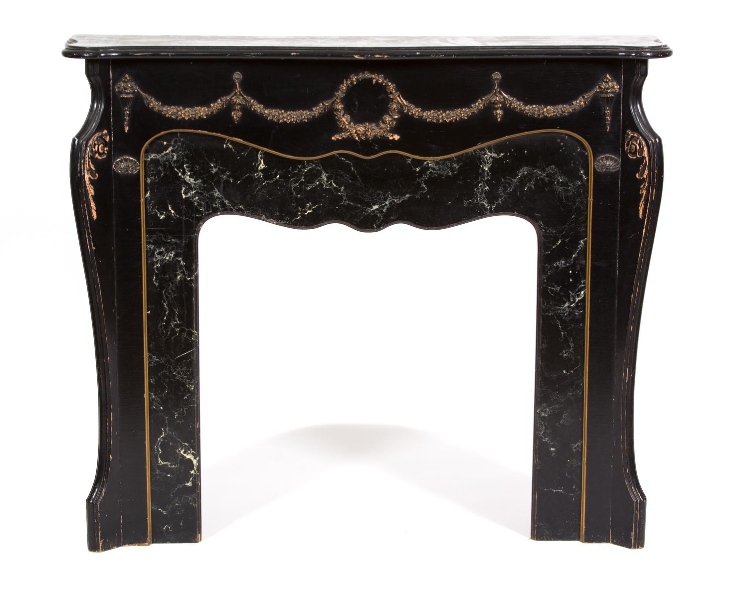 A Louis XV Style Ebonized Wood and Faux Marble Fire Place Surround Height 44 1/2 x width 52 1/4 x depth 12 1/2 inches. — 20TH CENTURY