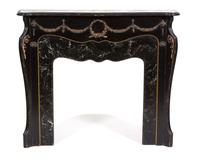 A Louis XV Style Ebonized Wood and Faux Marble Fire Place Surround Height 44 1/2 x width 52 1/4 x depth 12 1/2 inches. — 20TH CENTURY