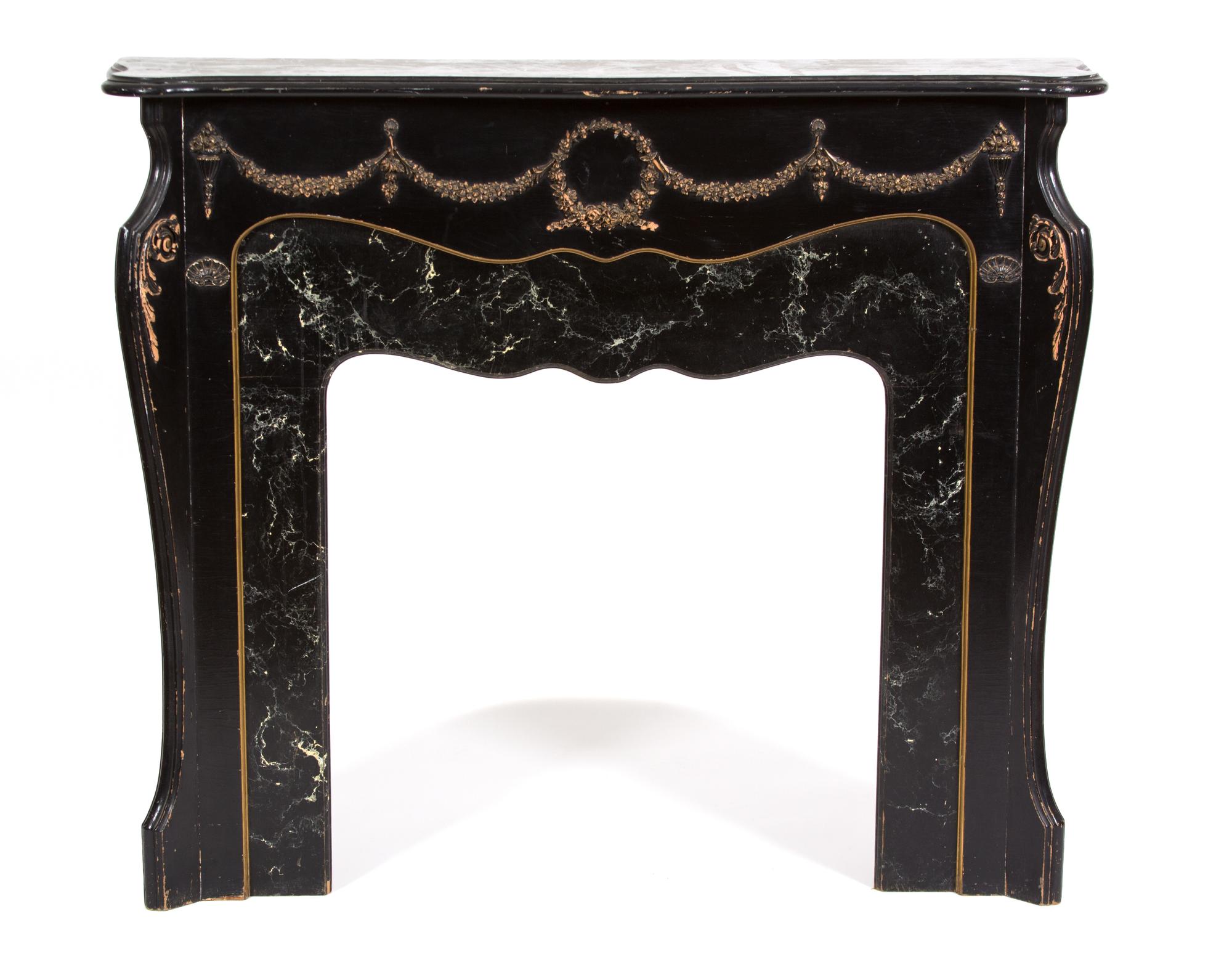 A Louis XV Style Ebonized Wood and Faux Marble Fire Place Surround Height 44 1/2 x width 52 1/4 x depth 12 1/2 inches. — 20TH CENTURY