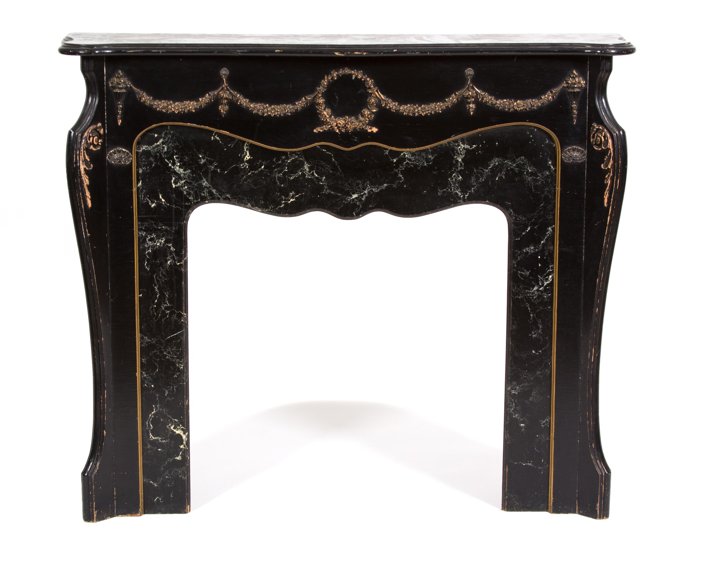 A Louis XV Style Ebonized Wood and Faux Marble Fire Place Surround Height 44 1/2 x width 52 1/4 x depth 12 1/2 inches. — 20TH CENTURY