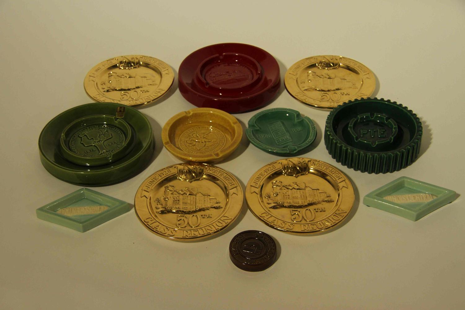 A Collection of Commemorative Haeger Pottery Ash Receivers Width of widest 13 inches.
