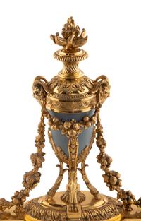 A Pair of French Gilt Bronze and Painted Tole Chenets