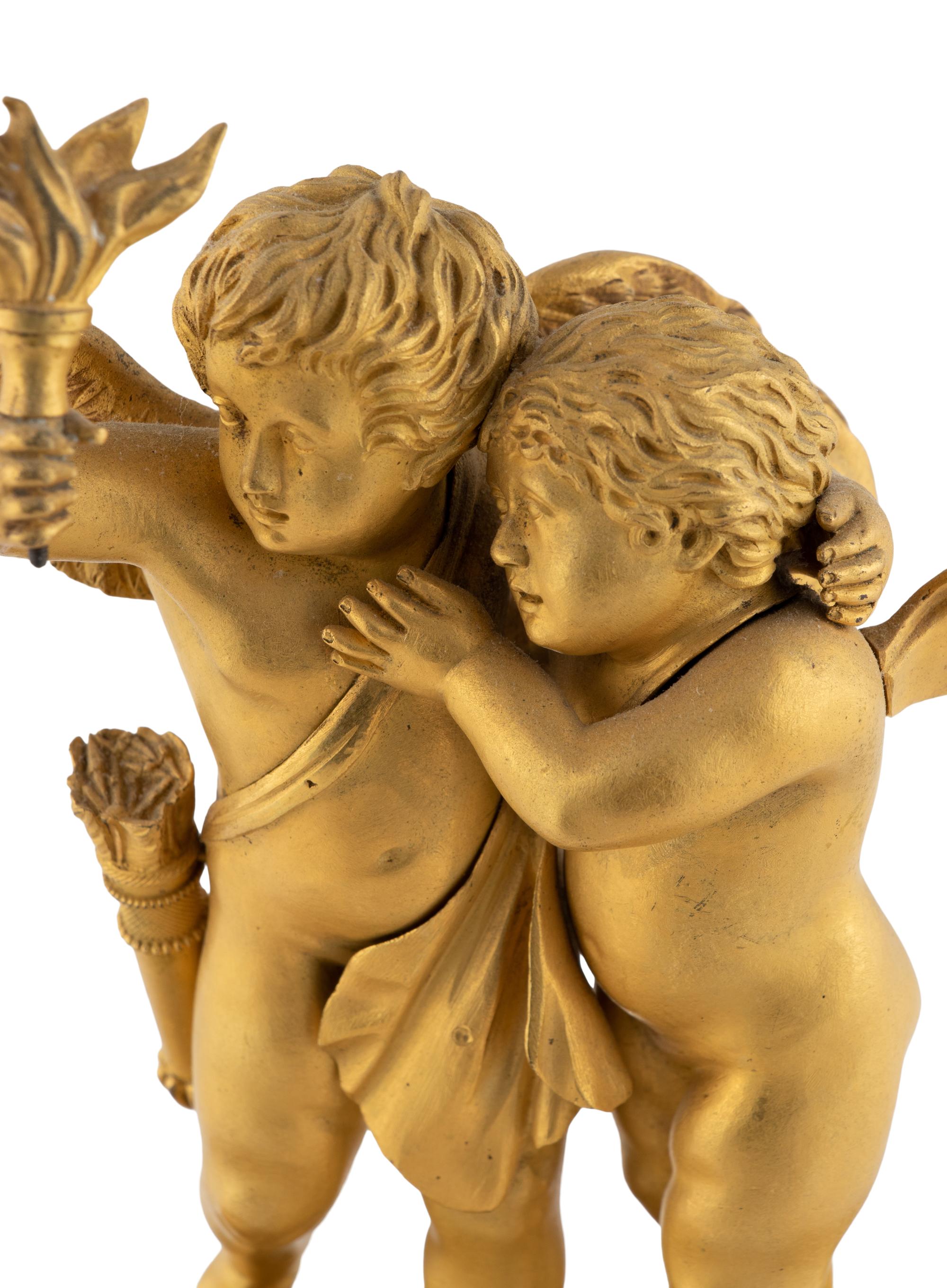An Empire Gilt Bronze Figural Mantel Clock