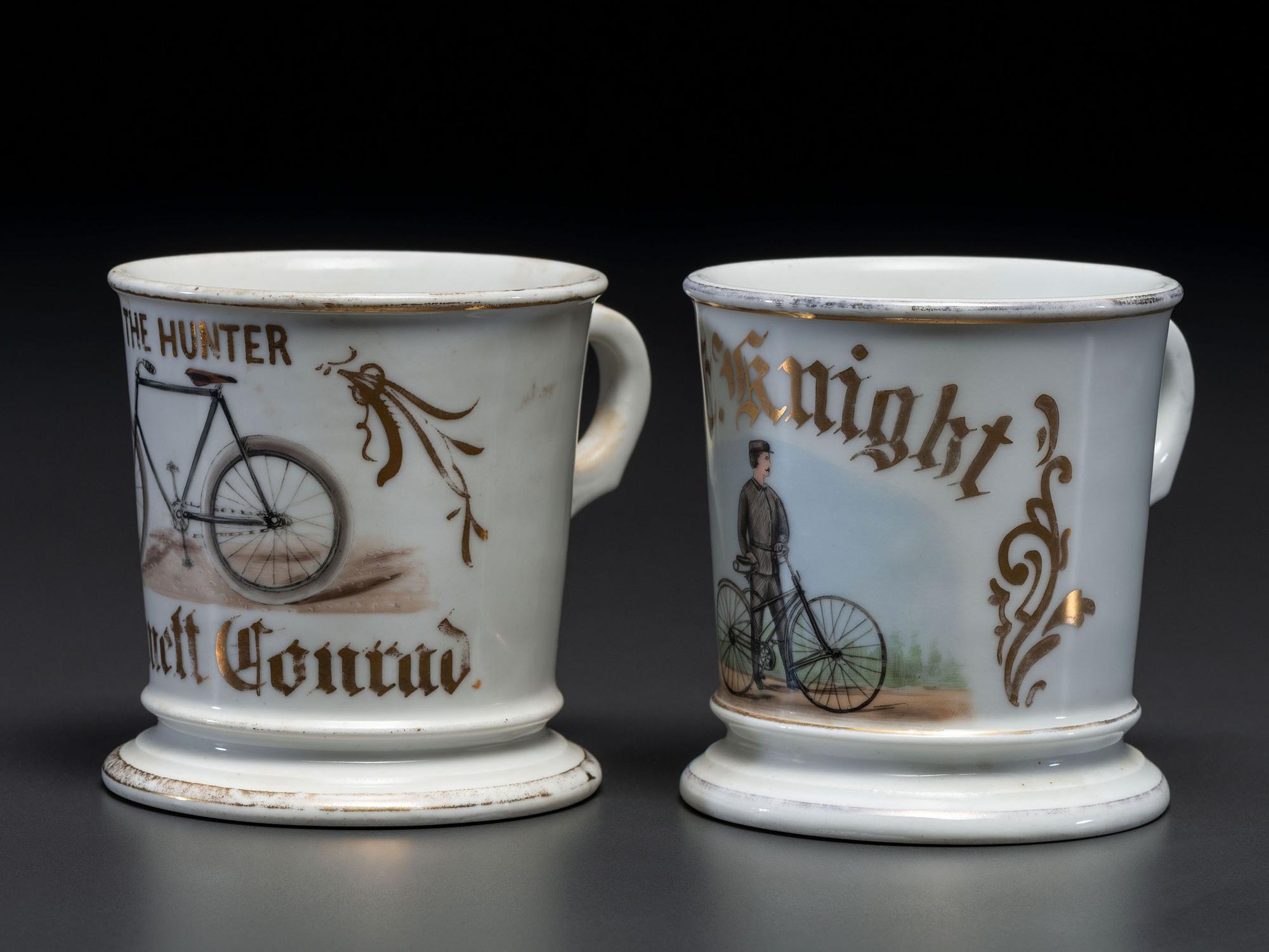 Two Cyclist's Porcelain Shaving Mugs