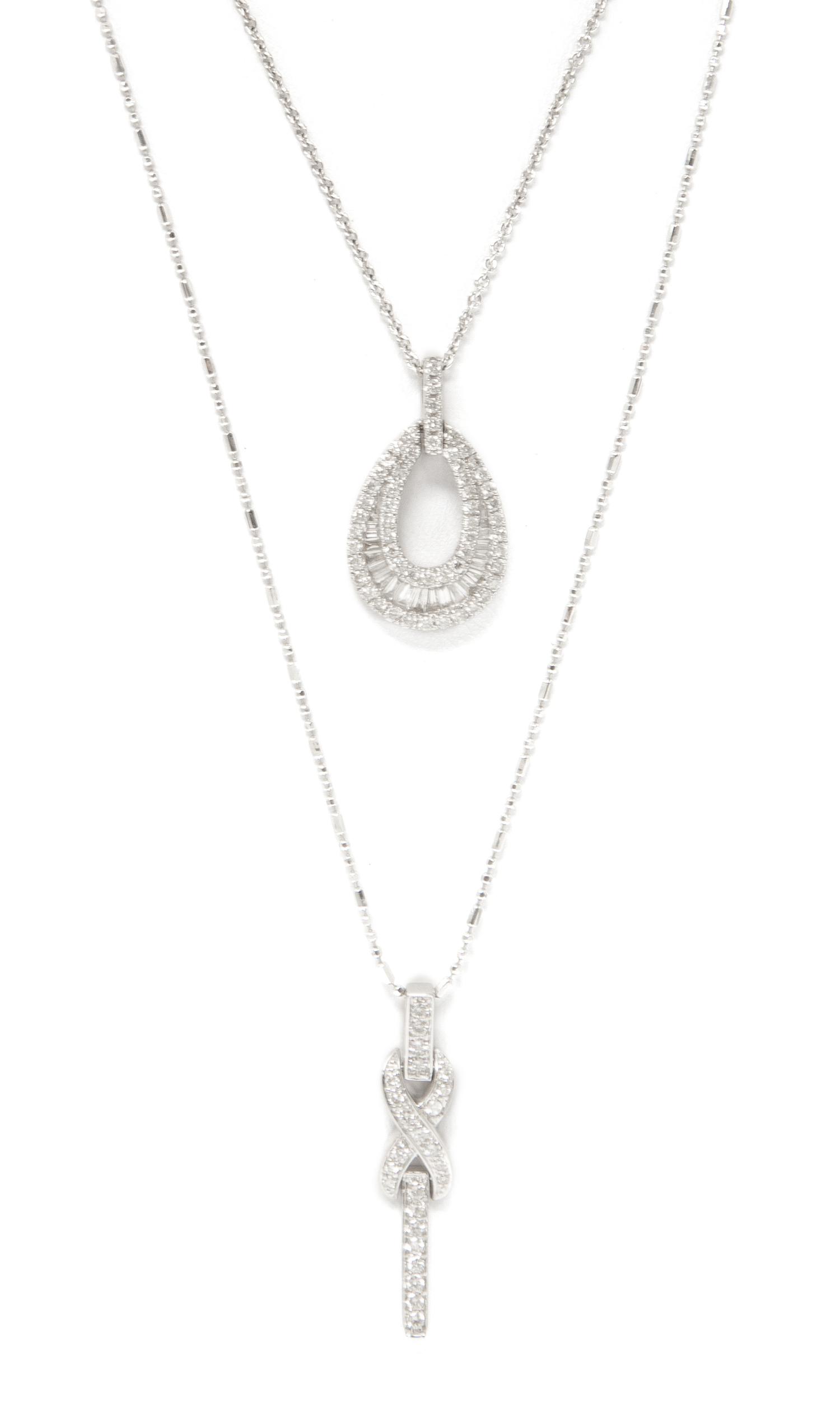 A Collection of 18 Karat White Gold and Diamond Pendant Necklaces, 5.10 dwts.