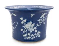 A Chinese White Slip Decorated Blue Glazed Porcelain Cache Pot Diameter 10 1/2 inches.