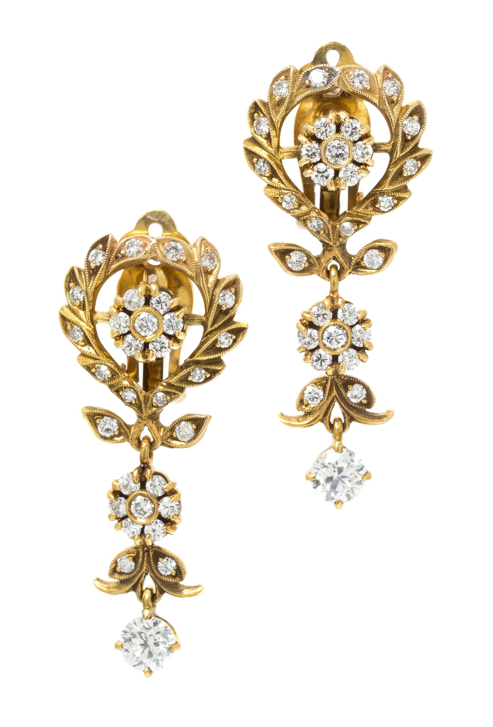 A Pair of Yellow Gold and Diamond Foliate Motif Earclips, 5.60 dwts.