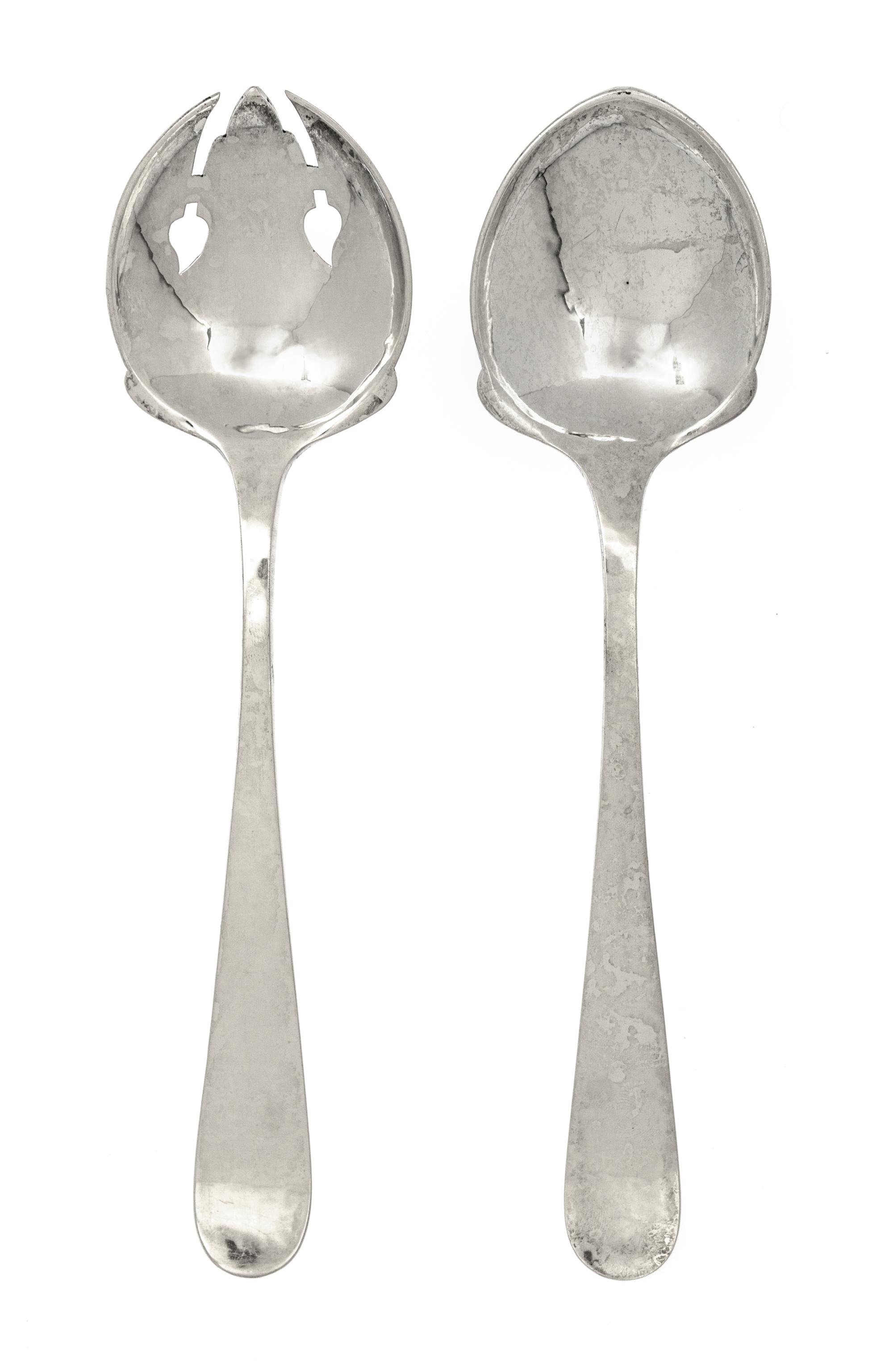 An American Arts and Crafts Silver Salad Set, Kalo Shop, Chicago, IL, comprising a fork and a spoon, each with hammered finish.