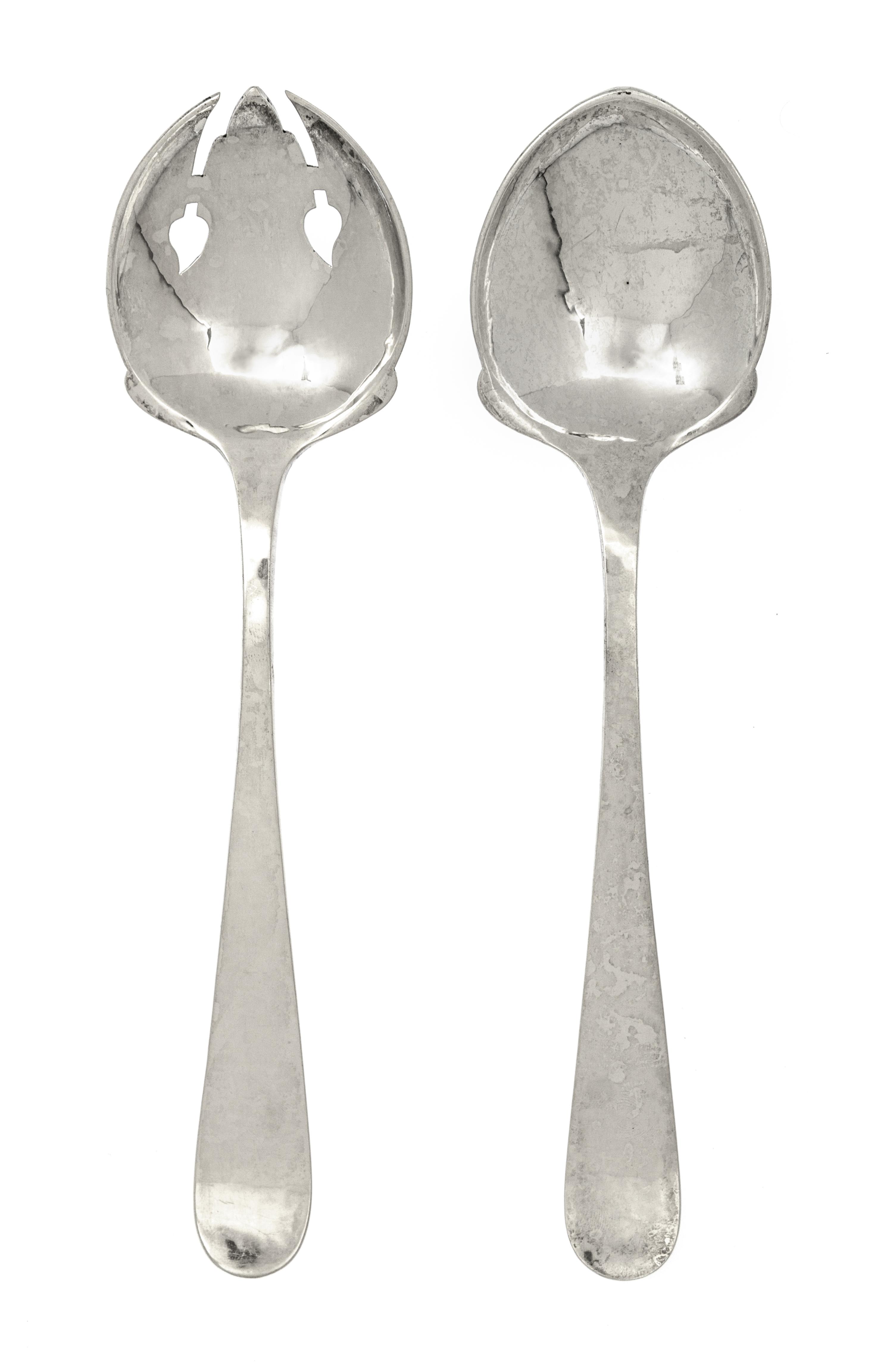 An American Arts and Crafts Silver Salad Set, Kalo Shop, Chicago, IL, comprising a fork and a spoon, each with hammered finish.