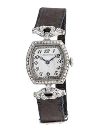TIFFANY & CO., ART DECO, PLATINUM AND DIAMOND WATCH
