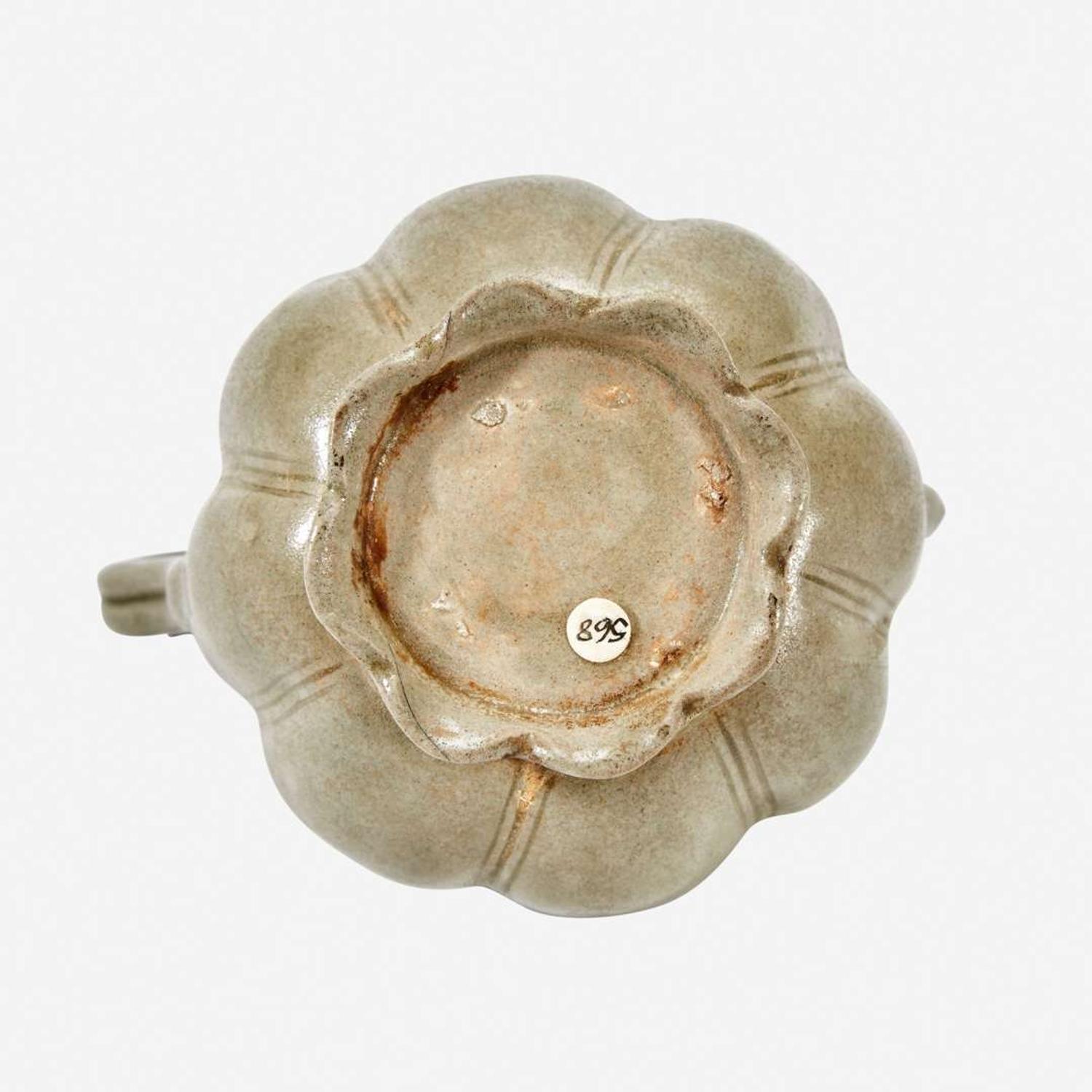 A Chinese celadon-glazed melon-form small ewer and cover Song Dynasty