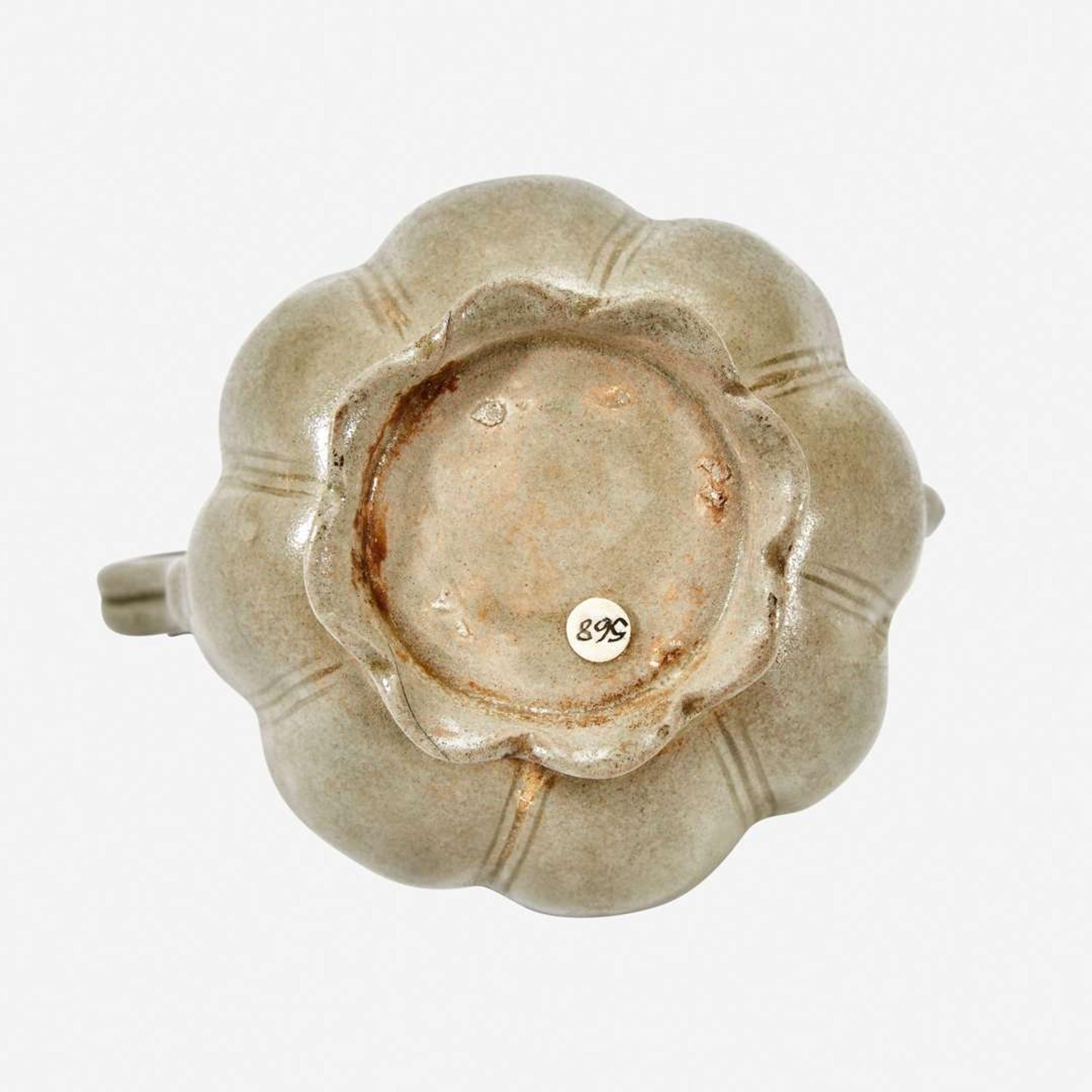 A Chinese celadon-glazed melon-form small ewer and cover Song Dynasty
