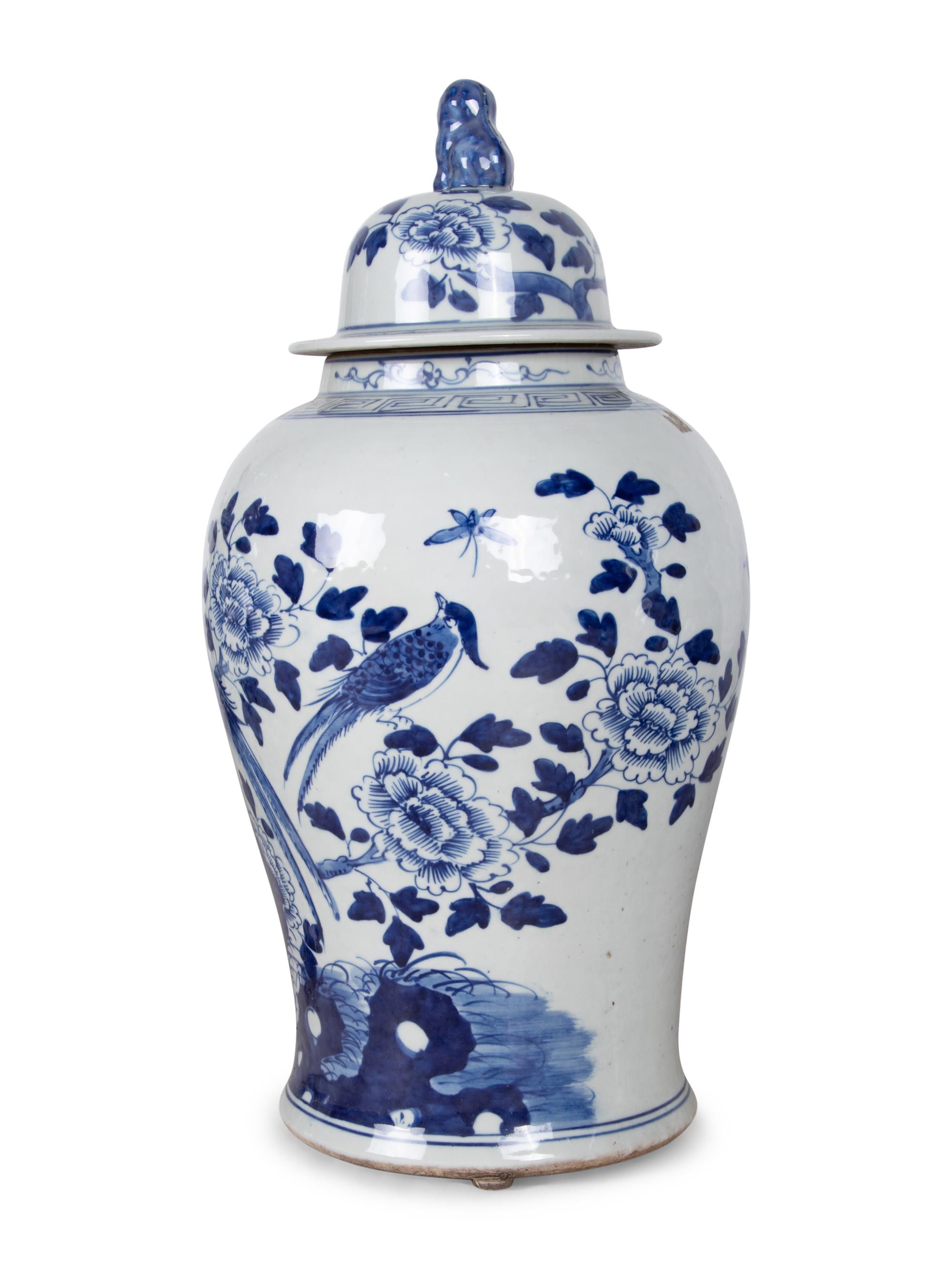 Five Blue and White Ceramic Covered Jars