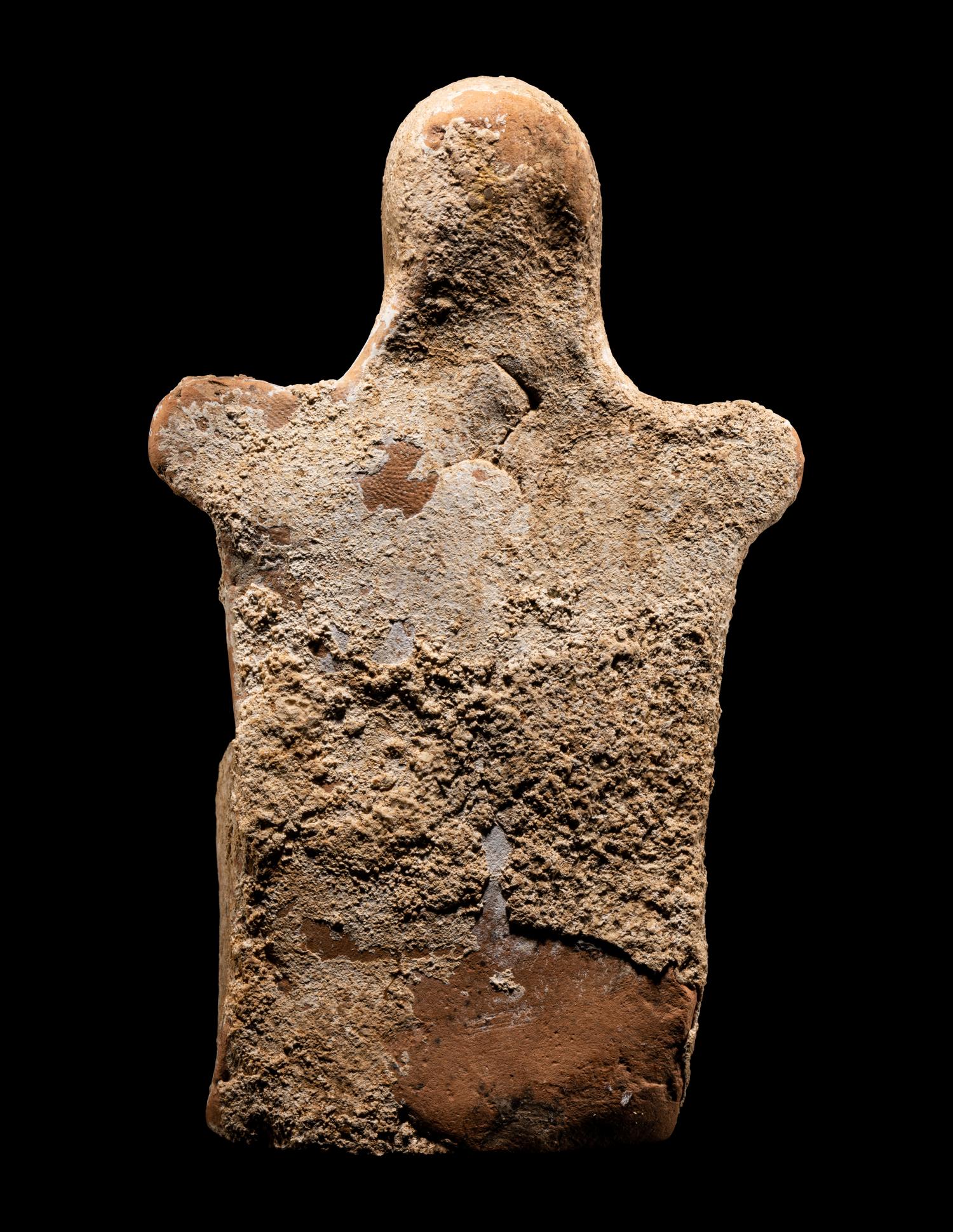 A Greek Terracotta of a Seated Female Deity