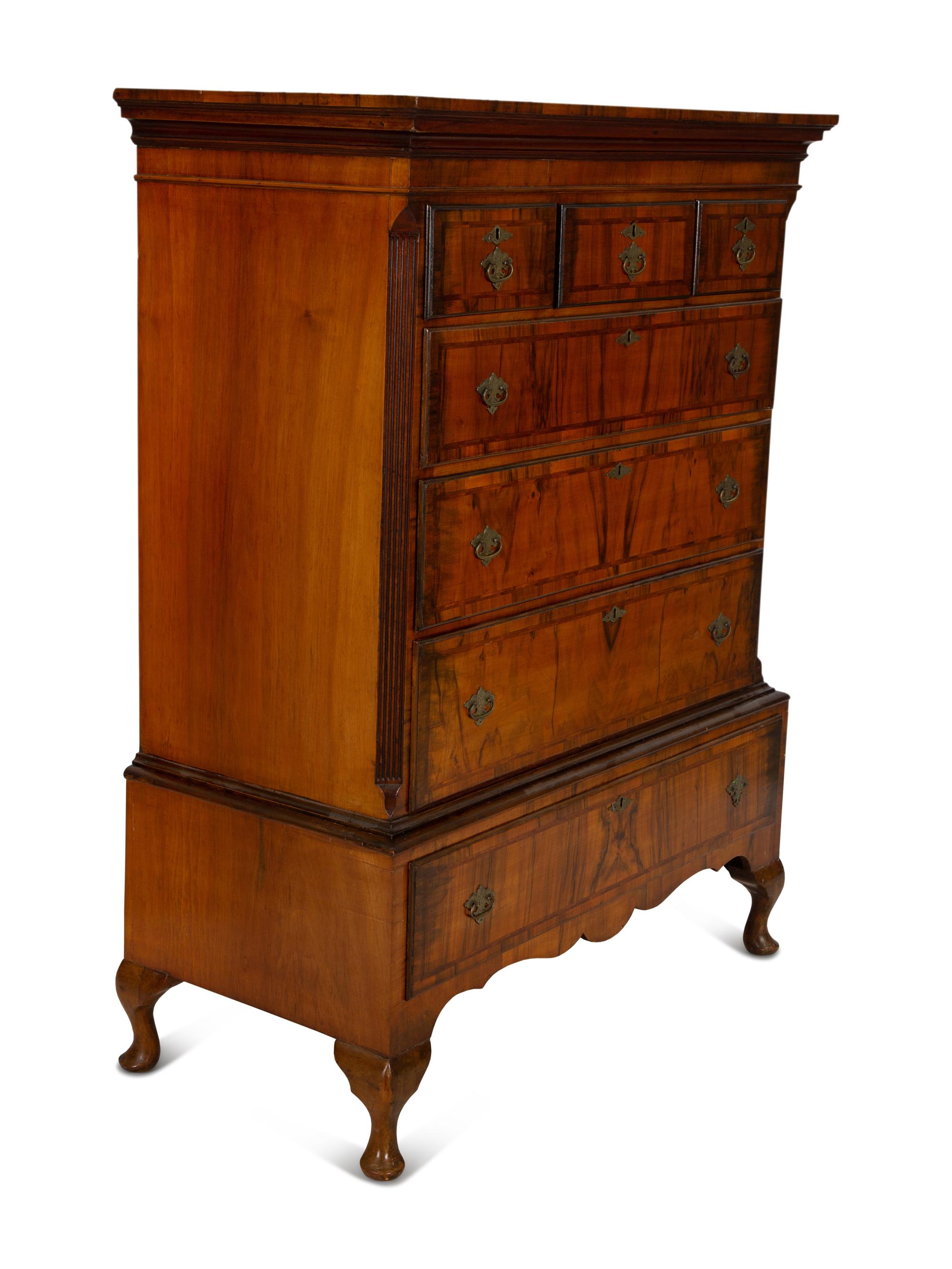 A Queen Anne Figured Mahogany Chest on Stand