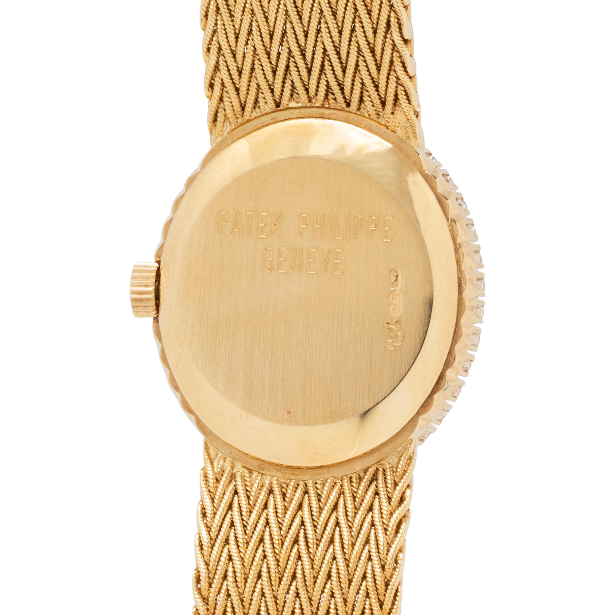 PATEK PHILIPPE, REF. 4506/1 18K YELLOW GOLD AND DIAMOND WATCH