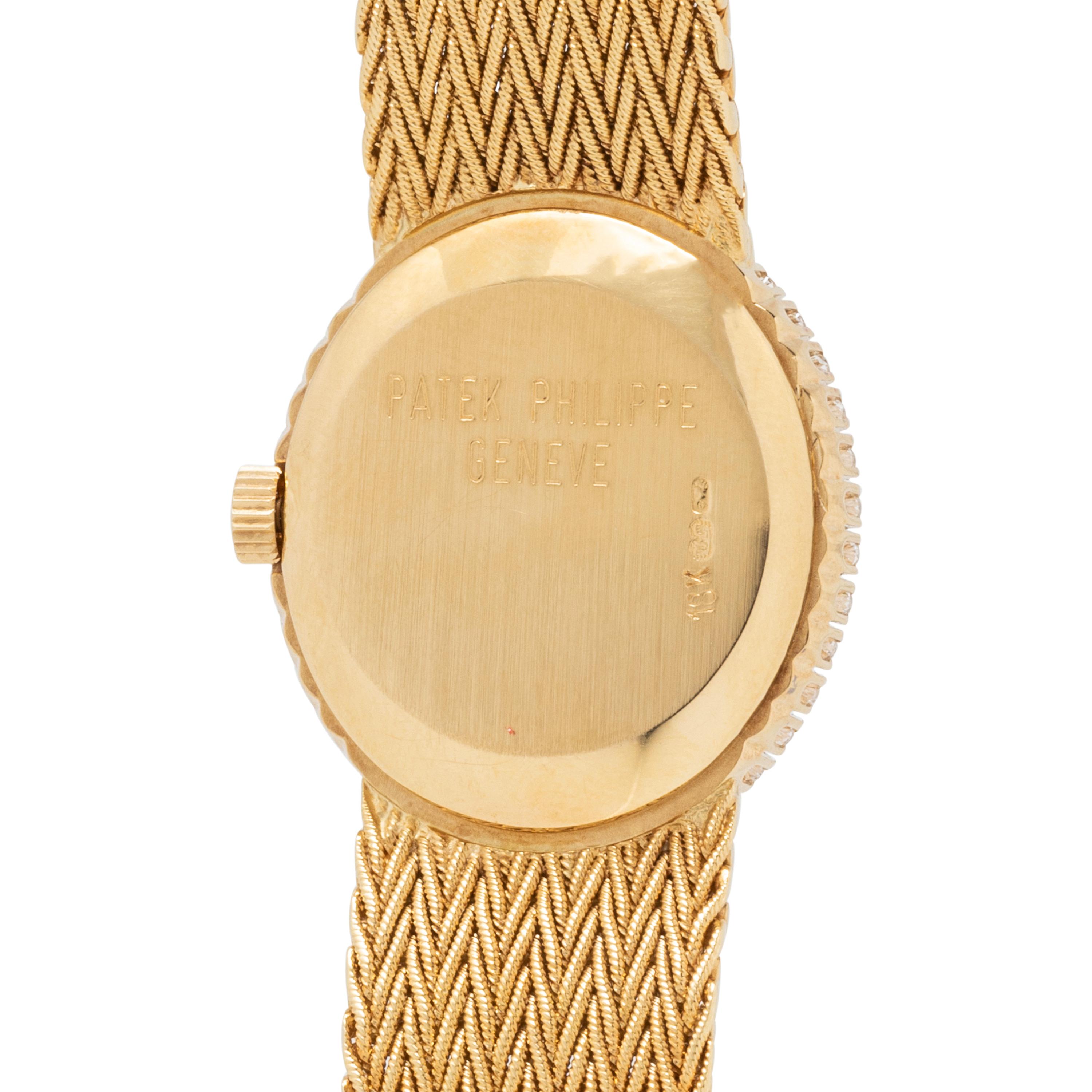 PATEK PHILIPPE, REF. 4506/1 18K YELLOW GOLD AND DIAMOND WATCH