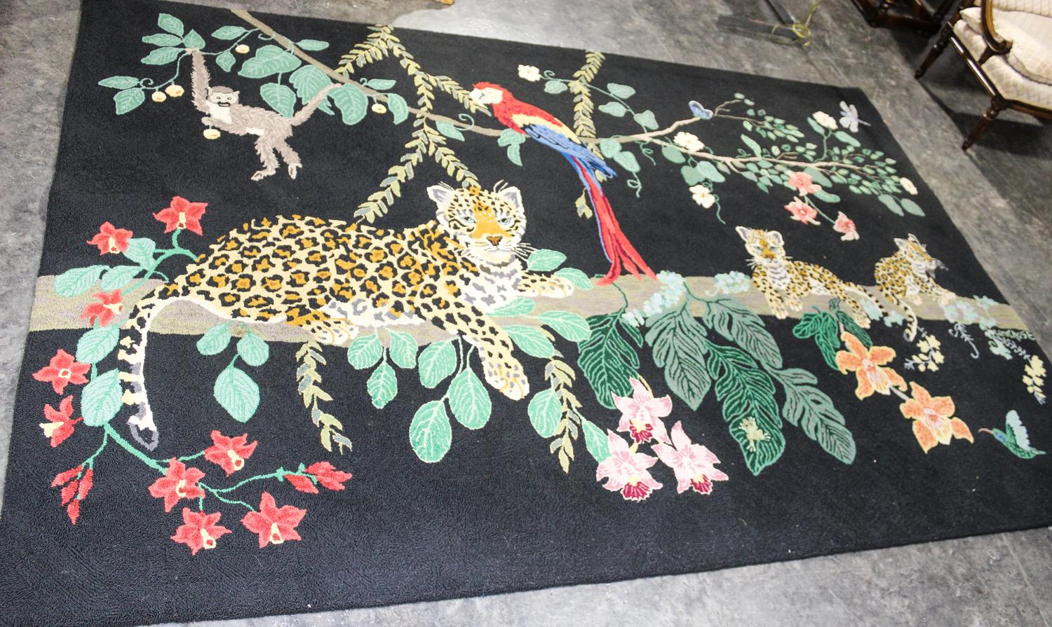 An American Hooked Rug 6 feet x 8 feet 9 inches. — 20TH CENTURY