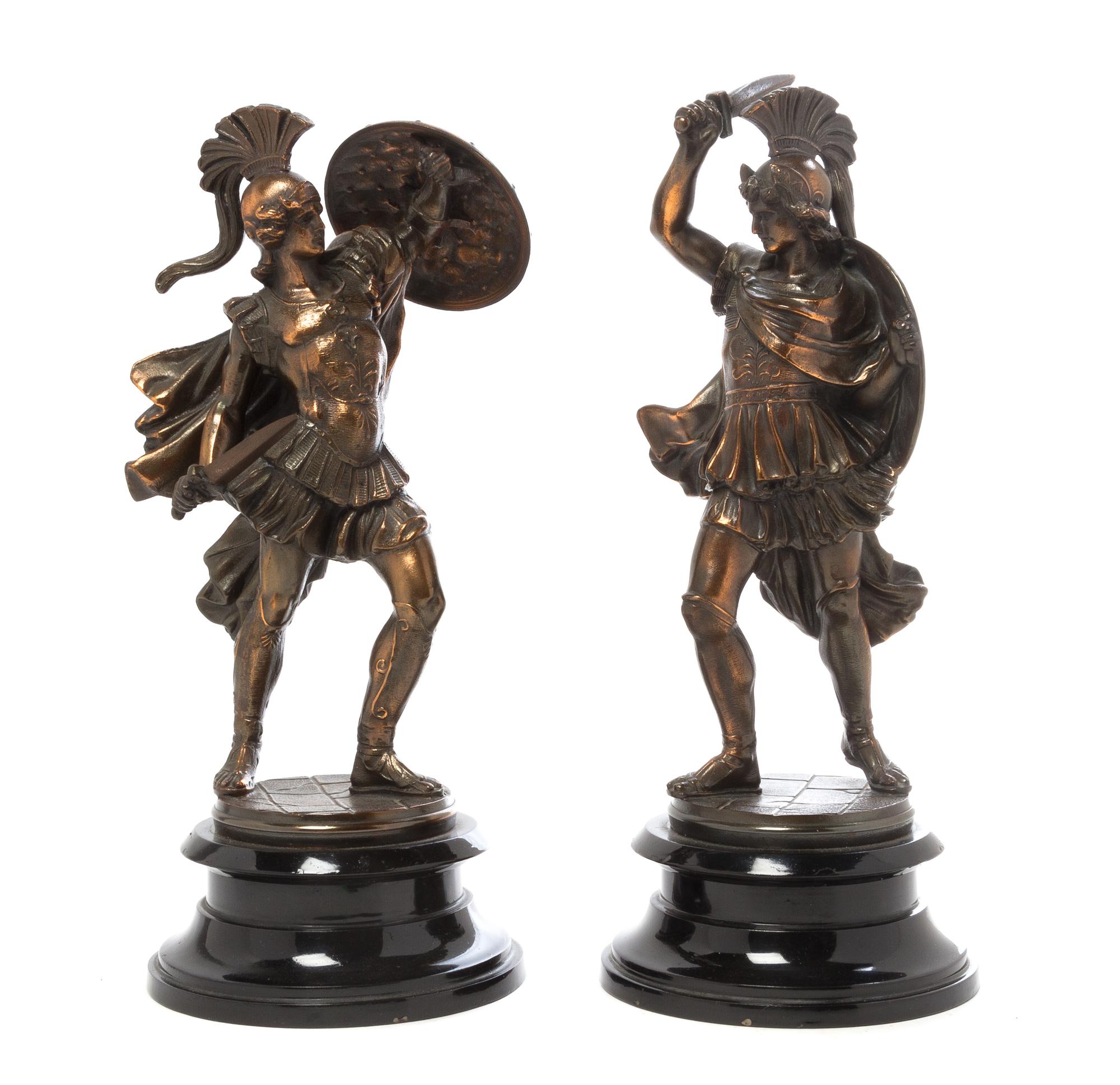 A Pair of Continental Cast Metal Figures Height 13 1/2 inches.