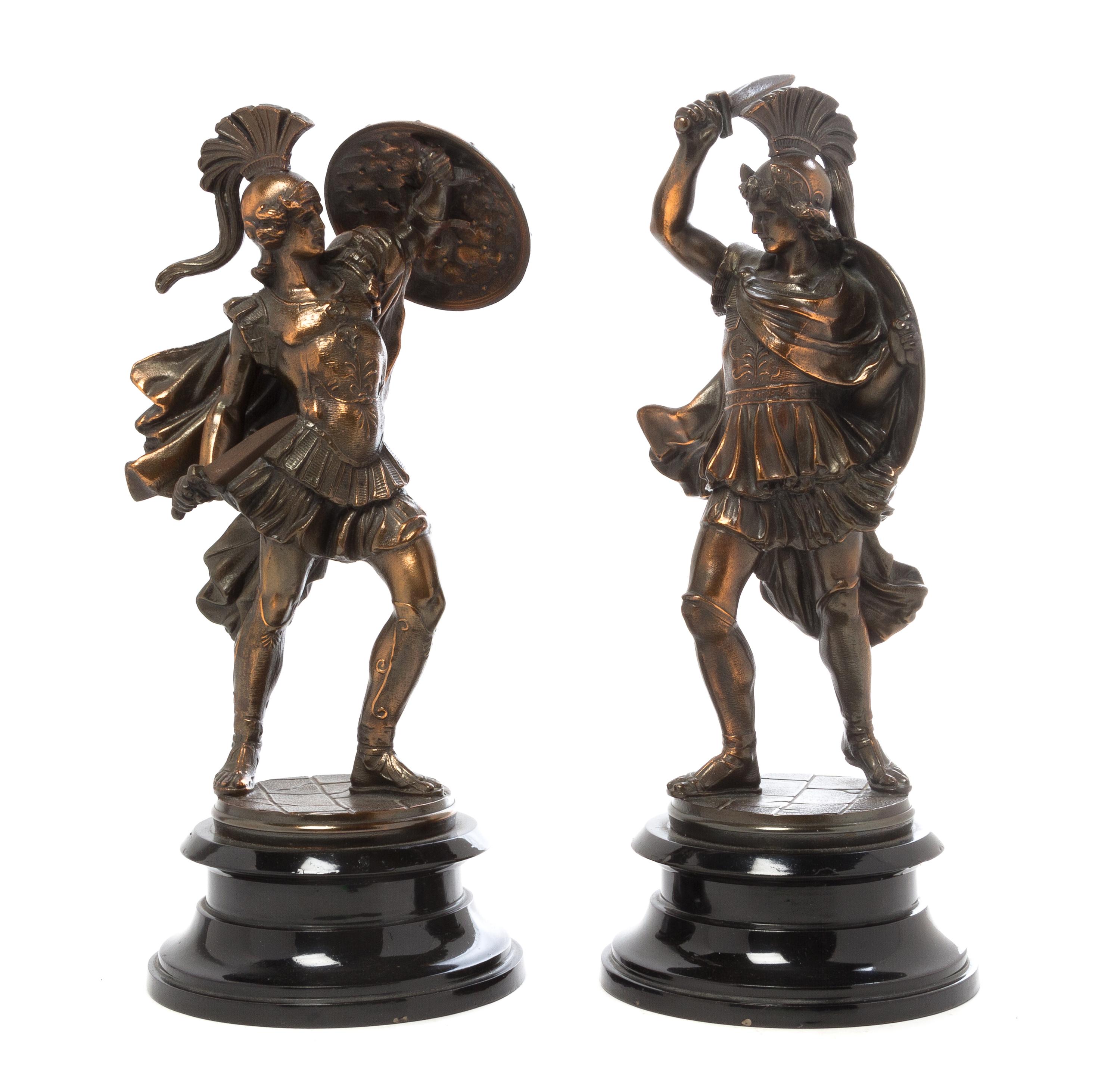 A Pair of Continental Cast Metal Figures Height 13 1/2 inches.