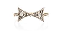 A Victorian Silver Topped Gold and Diamond Bow Motif Bangle, 11.10 dwts.