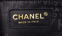 A Chanel Blue Suede Quilted Bowling Bag, 11" x 6.5" x 4.5".